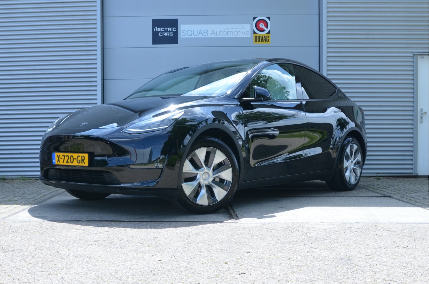 Tesla Model Y - Long Range AWD 75 kWh AutoPilot, Trekhaak (max 1.600kg) - AutoWereld.nl