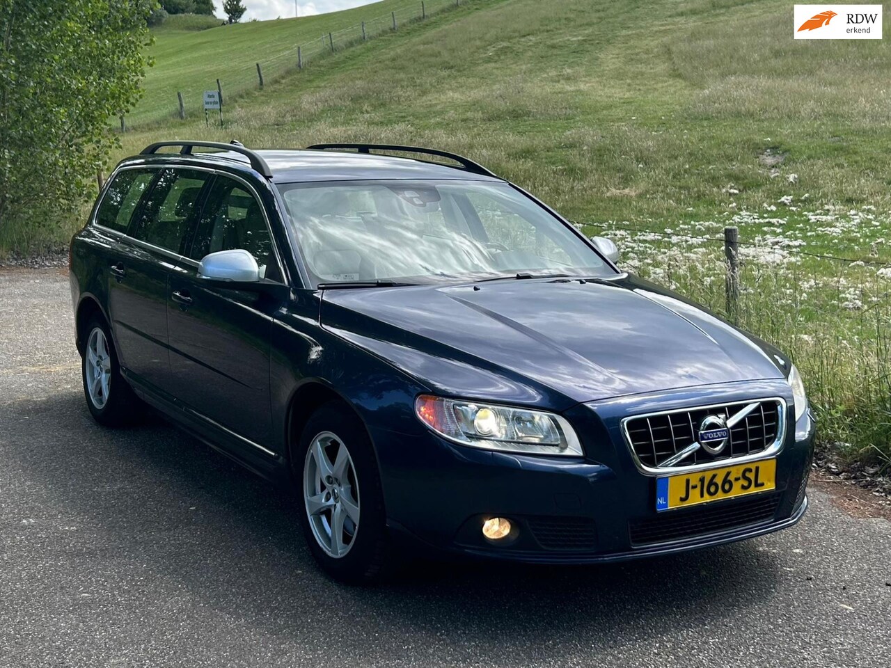 Volvo V70 - 2012 2.5FT LEER/Clima/BTaudio/HF/Facelift - AutoWereld.nl