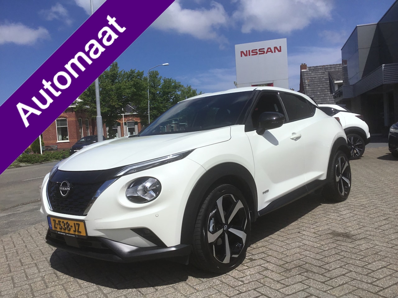 Nissan Juke - 1.6 HEV DCT Tekna - AutoWereld.nl