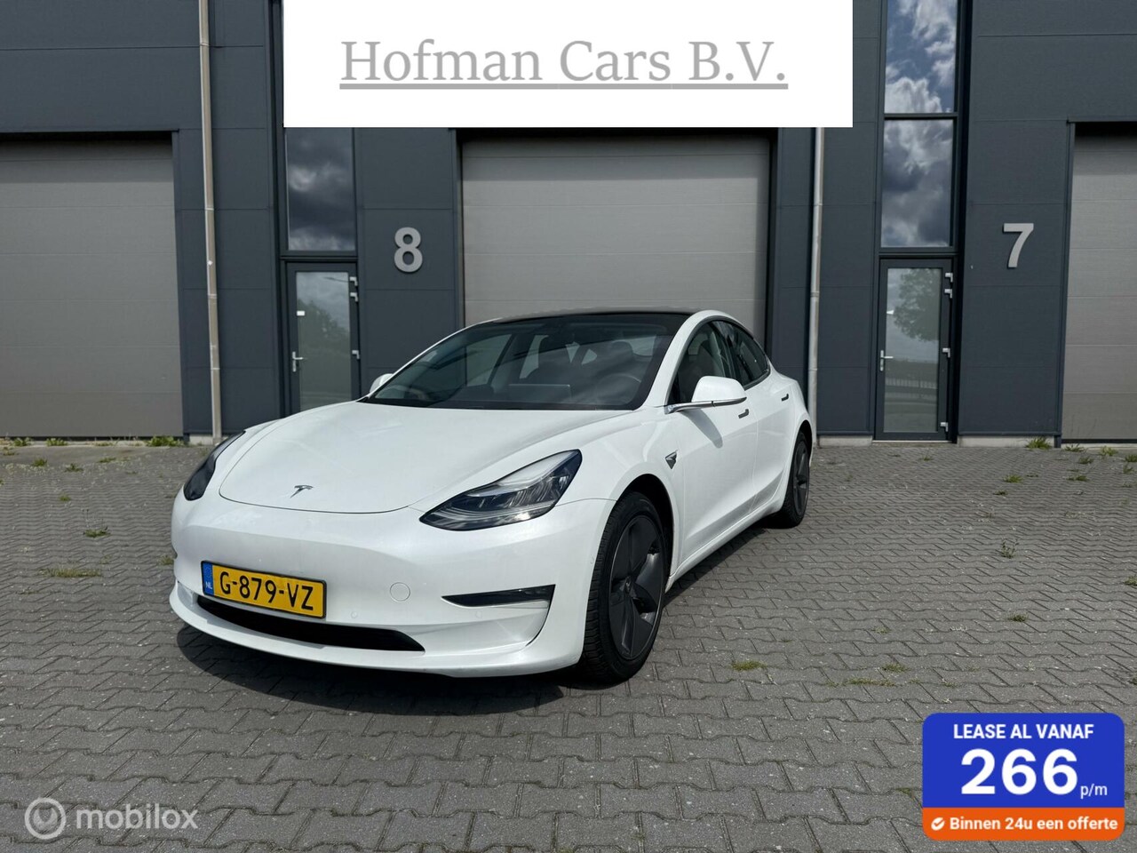 Tesla Model 3 - Long Range RWD Long Range AWD 75 kWh TREKHAAK Pearl White Incl. BTW - AutoWereld.nl