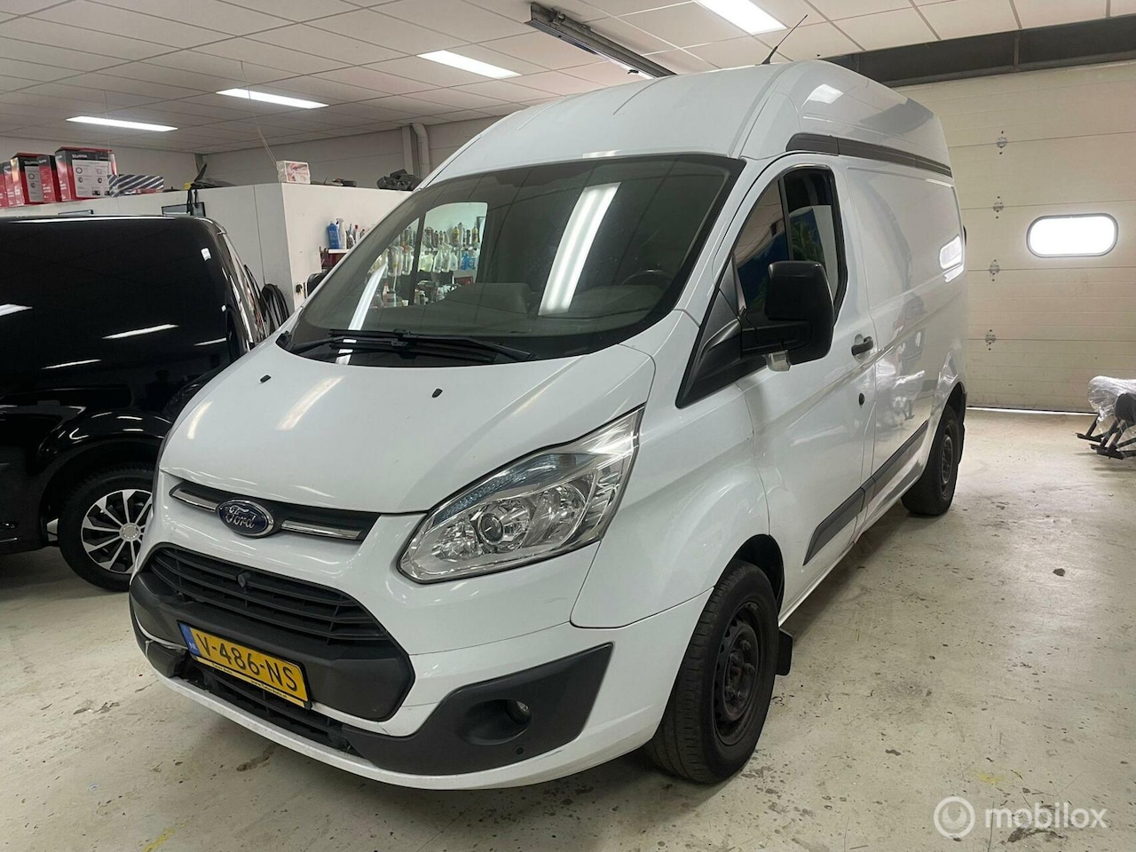 Ford Transit Custom - 2.2 TDCI L2H2 Airco Cruise - AutoWereld.nl