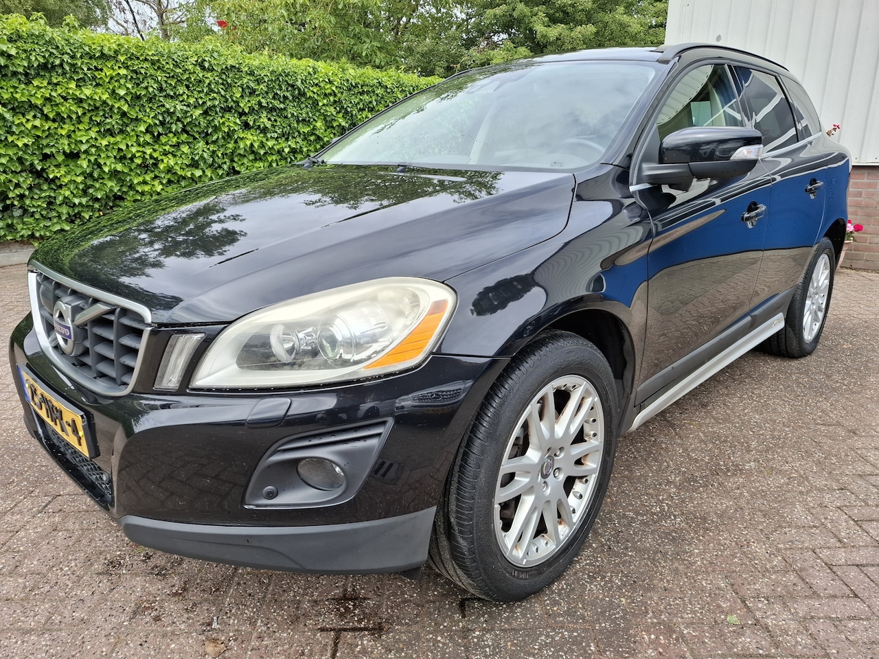 Volvo XC60 - 3.0 T6 AWD Summum LEER/CLIMAT/CRUISE/PDC 286PK - AutoWereld.nl