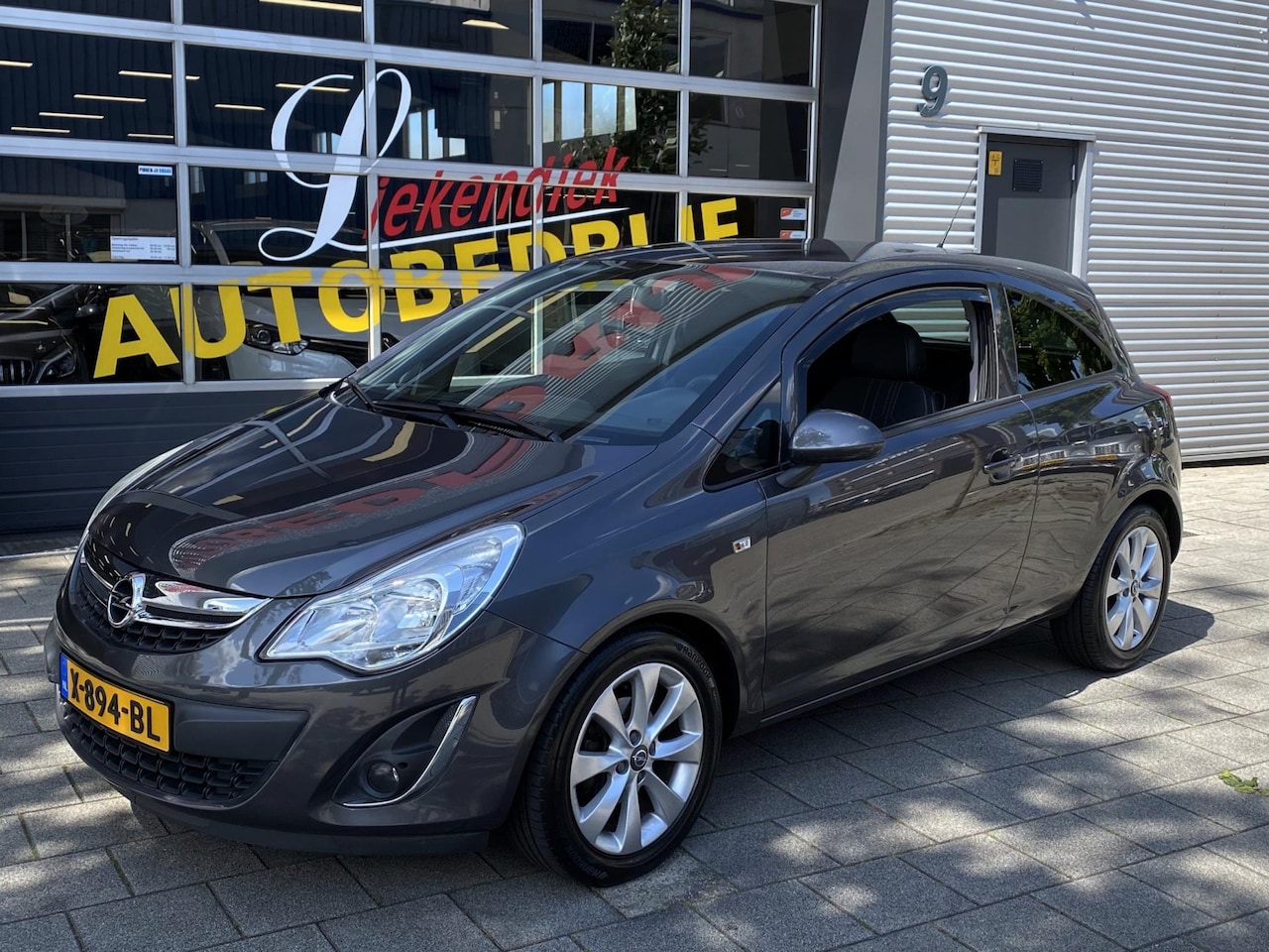 Opel Corsa - 1.4-16V Cosmo - Airco I PDC I Sport velgen I 1/2 Leer I Comfort pakket I Dealer onderhoude - AutoWereld.nl