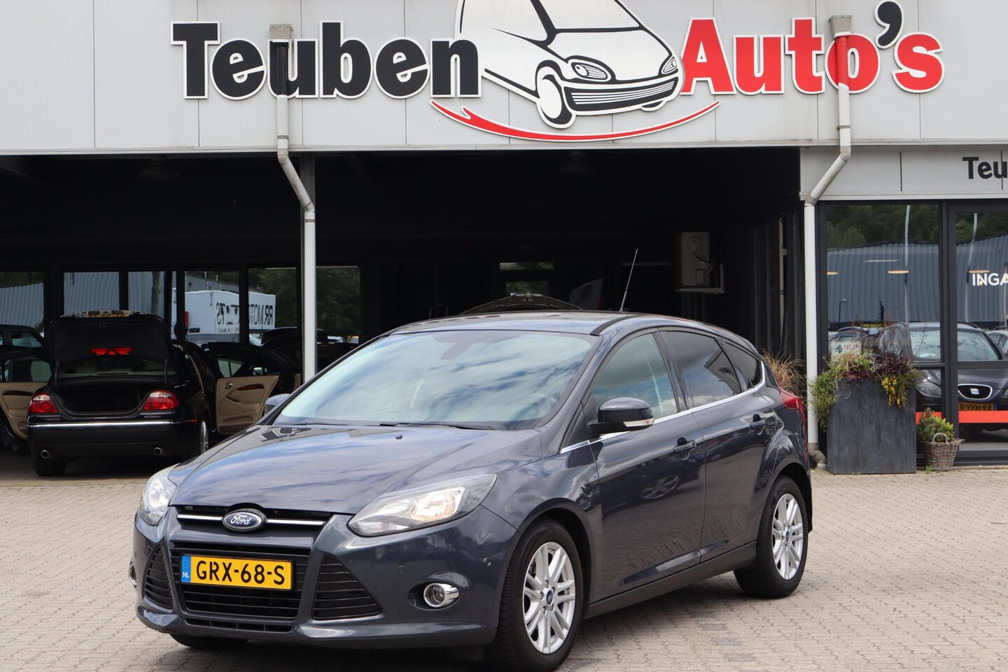 Ford Focus - 1.6 EcoBoost Titanium Stoelverwarming, Navigatie, Climate control, Elektrische ramen, Crui - AutoWereld.nl