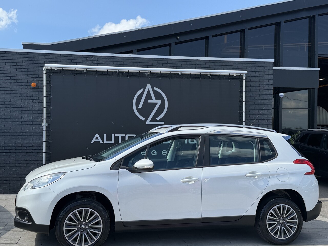 Peugeot 2008 - 1.2 PureTech Urban Cross 1.2 PureTech Urban Cross - AutoWereld.nl