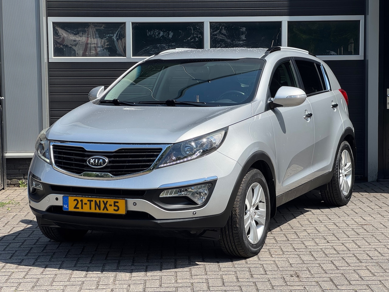 Kia Sportage - 2.0 X-ecutive Plus Pack Automaat, Trekhaak, Cruise, Climate Control, NAP - AutoWereld.nl