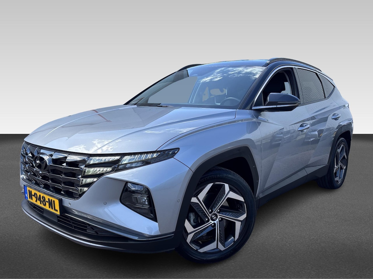 Hyundai Tucson - 1.6 T-GDI HEV Premium | zwart dak | volleder | trekhaak - AutoWereld.nl