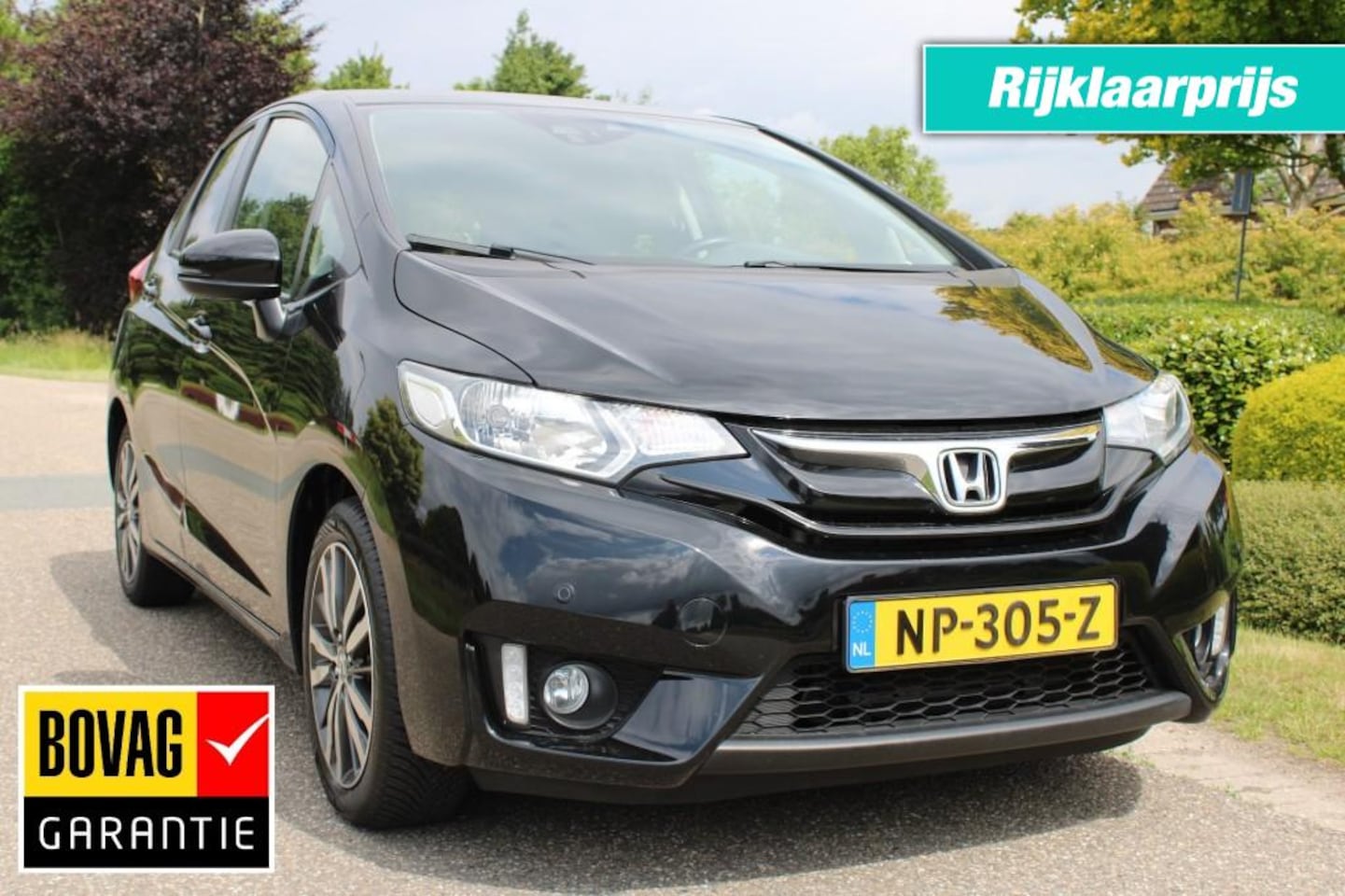 Honda Jazz - 1.3 I-VTEC 102pk Elegance ECC/camera/cruise/navi/trekhaak - AutoWereld.nl