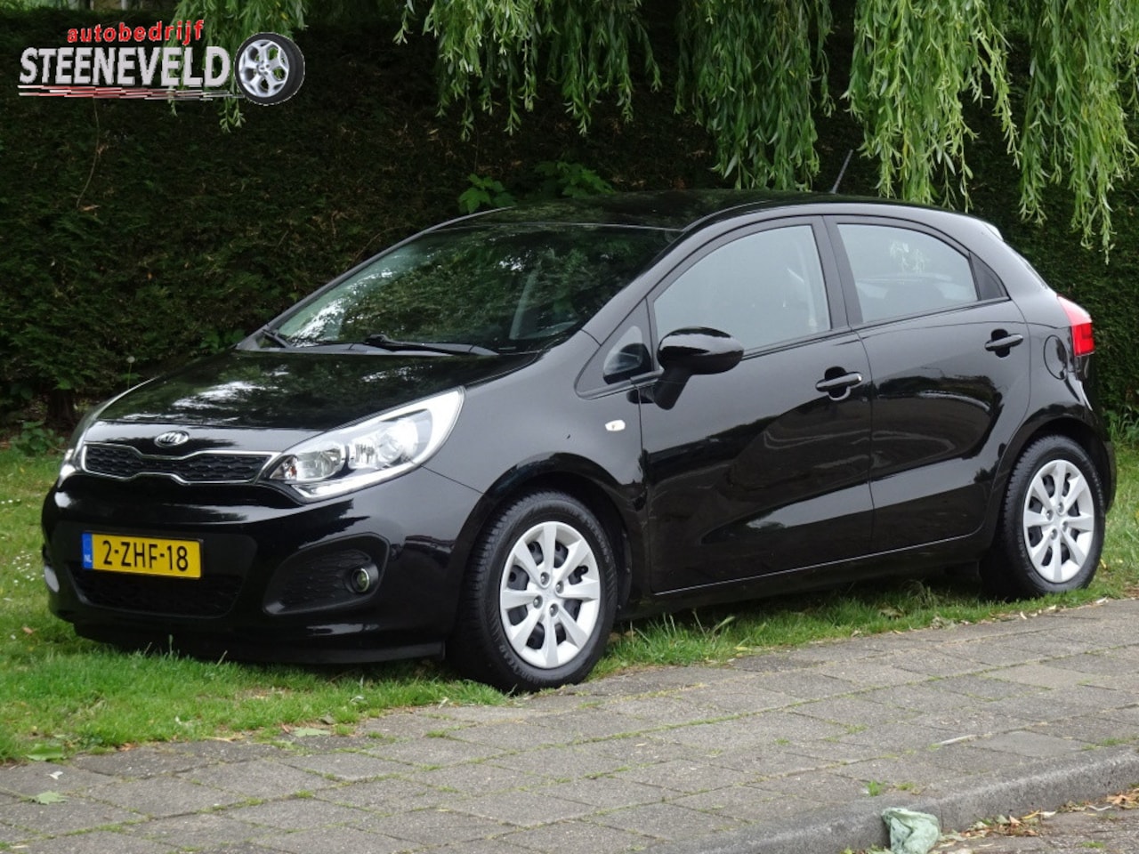 Kia Rio - 1.2 CVVT BusinessLine met Radio en Airco - AutoWereld.nl