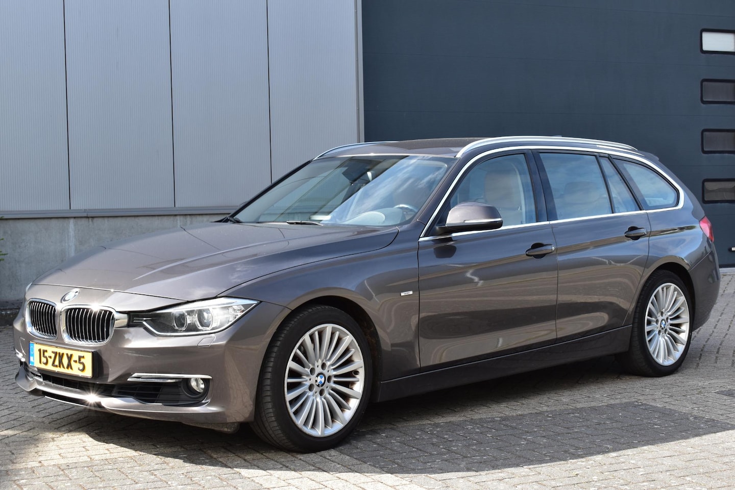 BMW 3-serie Touring - 328i High Executive Luxury NAP Havanna bruin Elek. trekhaak automaat - AutoWereld.nl