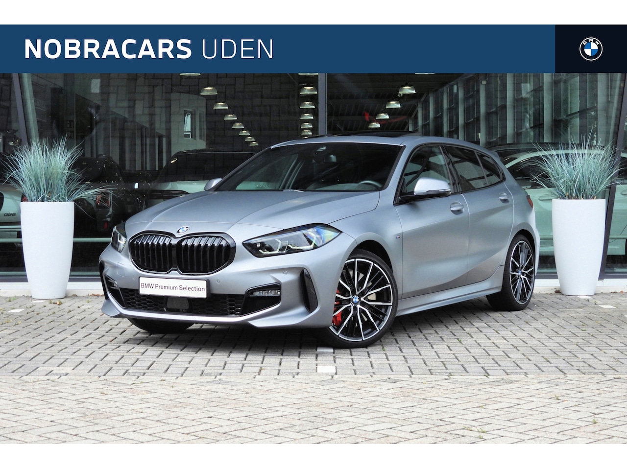BMW 1-serie - 118i High Executive M Sport Automaat / Panoramadak / Sportstoelen / Stoelverwarming / Adap - AutoWereld.nl