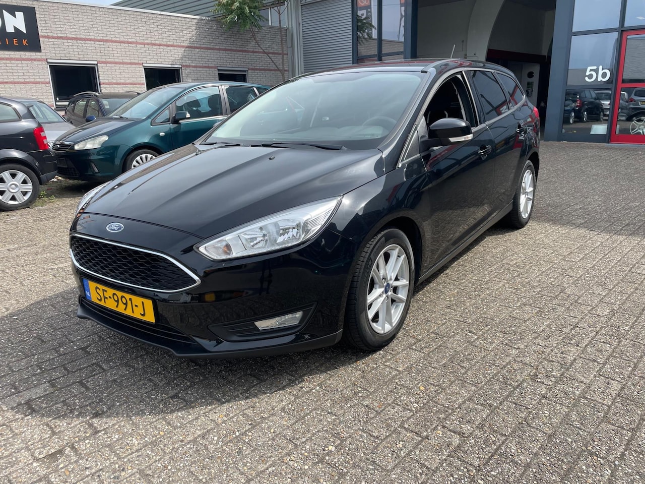Ford Focus Wagon - 1.0 Lease Edition navi clima enz - AutoWereld.nl