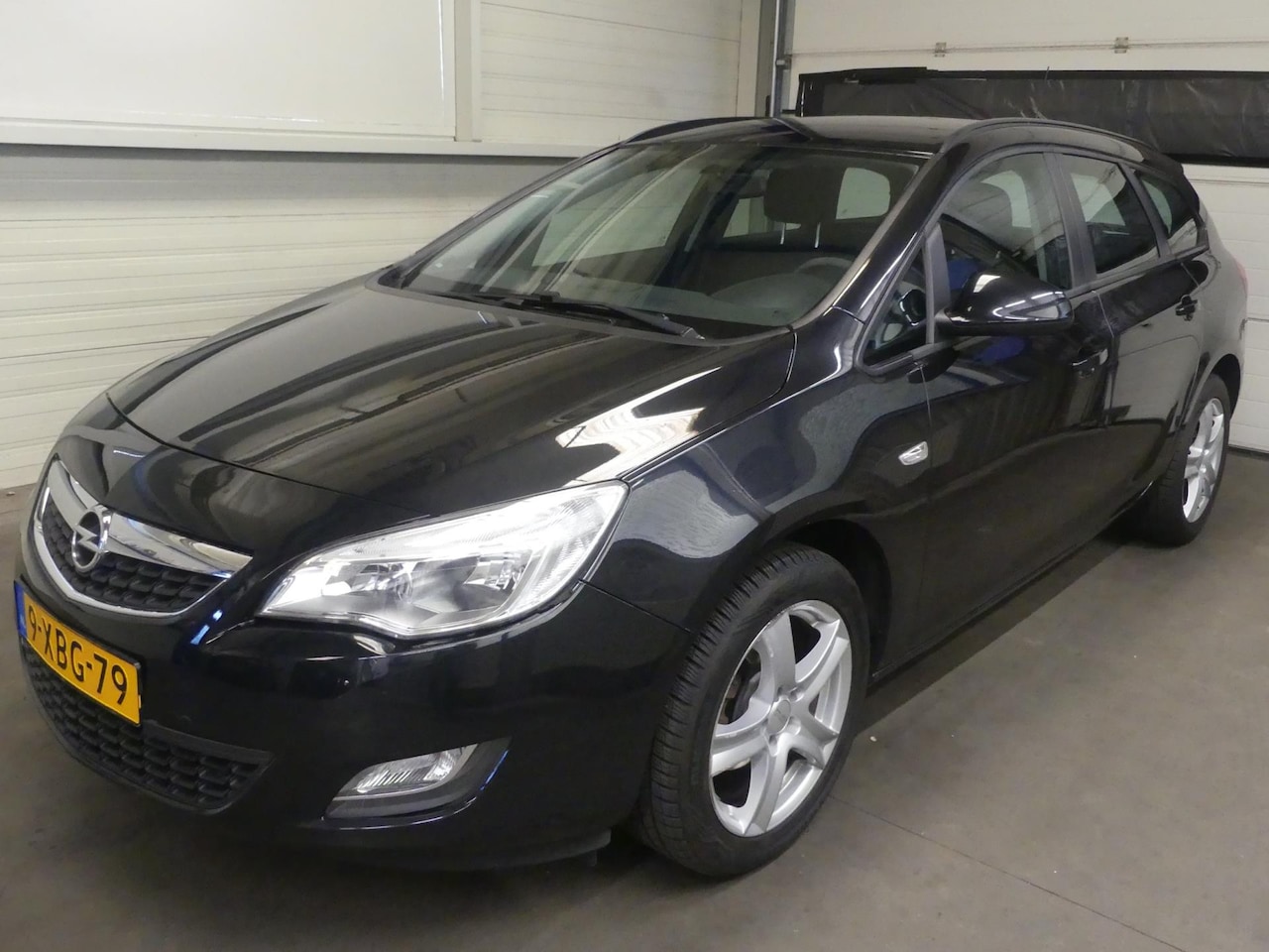 Opel Astra Sports Tourer - 1.4 - Airco - Cruise Control - Trekhaak - Mooie auto! - AutoWereld.nl
