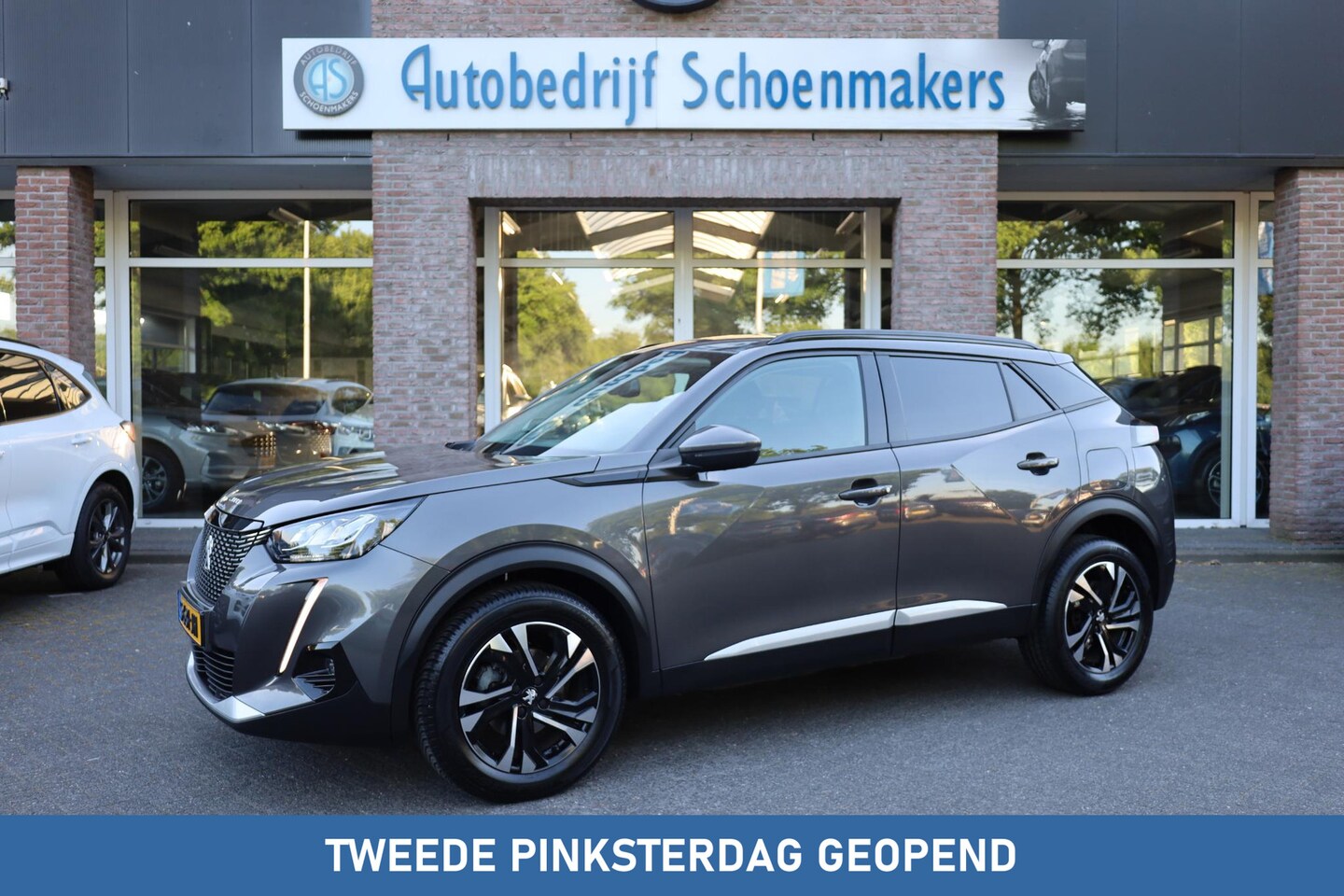 Peugeot 2008 - 1.2 PureTech Allure Pack CAMERA CRUISE CARPLAY DAB STOELVERW. HALF-LEDER 17"LMV ALL-SEASON - AutoWereld.nl