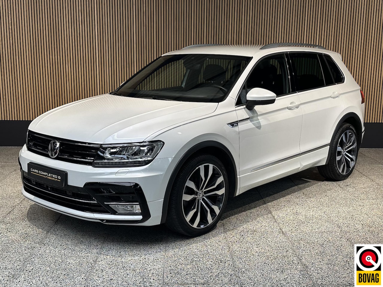 Volkswagen Tiguan - 2.0 TSI 4Motion Highline Business R 2 x R-line | Trekhaak | Standkachel - AutoWereld.nl