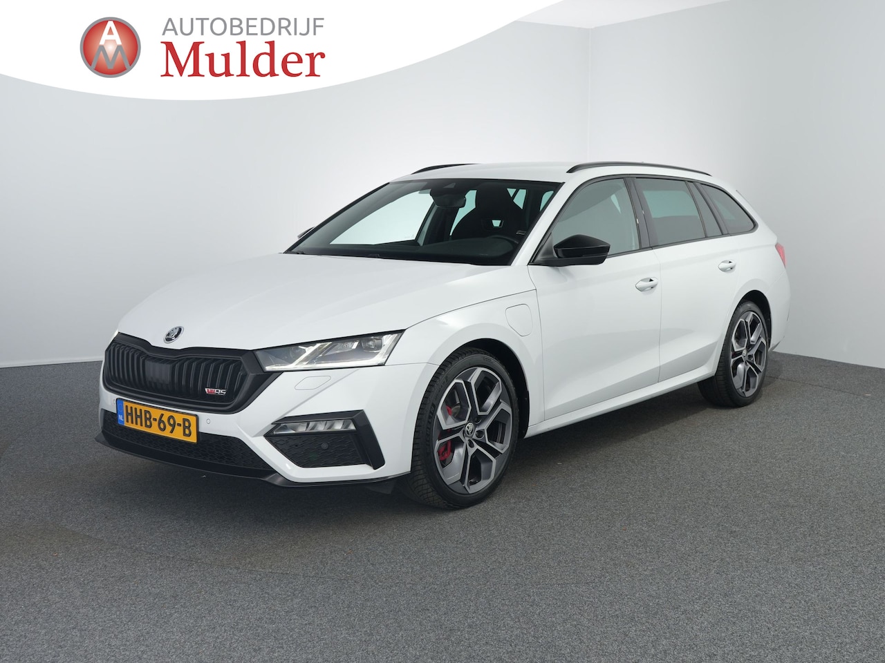 Skoda Octavia Combi - 1.4 TSI RS iV PHEV Business | Canton | Camera | ACC | winterpakket | - AutoWereld.nl