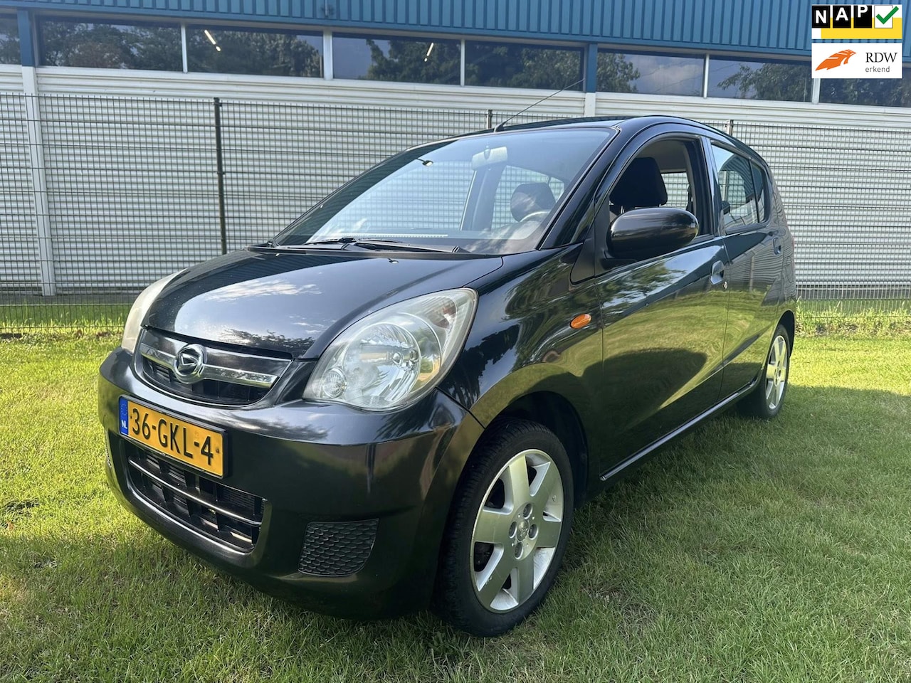 Daihatsu Cuore - 1.0 Premium + AIRCO - AutoWereld.nl