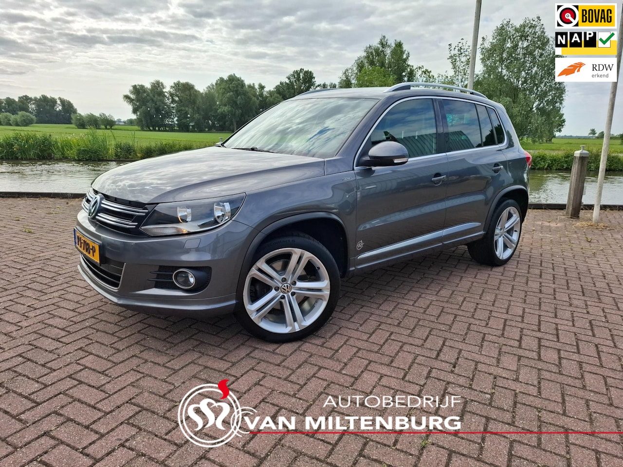 Volkswagen Tiguan - 1.4 TSI R-Line Edition Clima Camera Stoelverwarming Trekhaak PDC 19 inch velgen - AutoWereld.nl