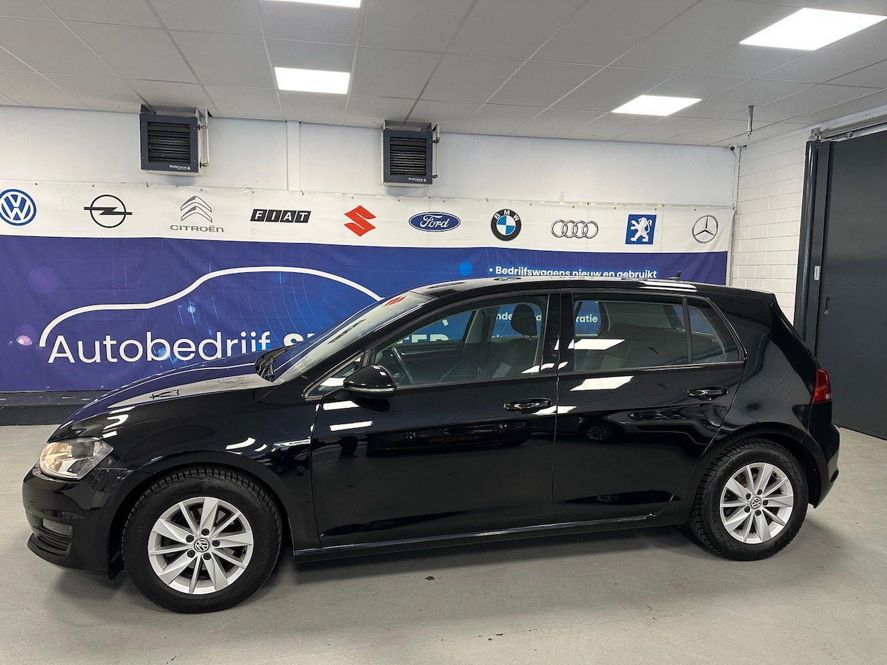 Volkswagen Golf - 1.0 TSI Trendline CRUISE/AIRCO - AutoWereld.nl