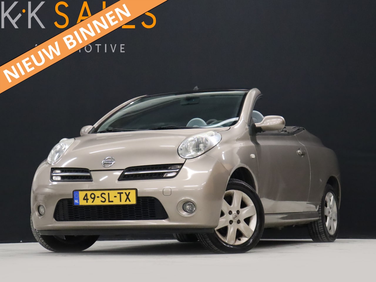 Nissan Micra - 1.4 Tekna [CABRIO, AIRCO, CD-SPELER, NIEUWSTAAT] - AutoWereld.nl