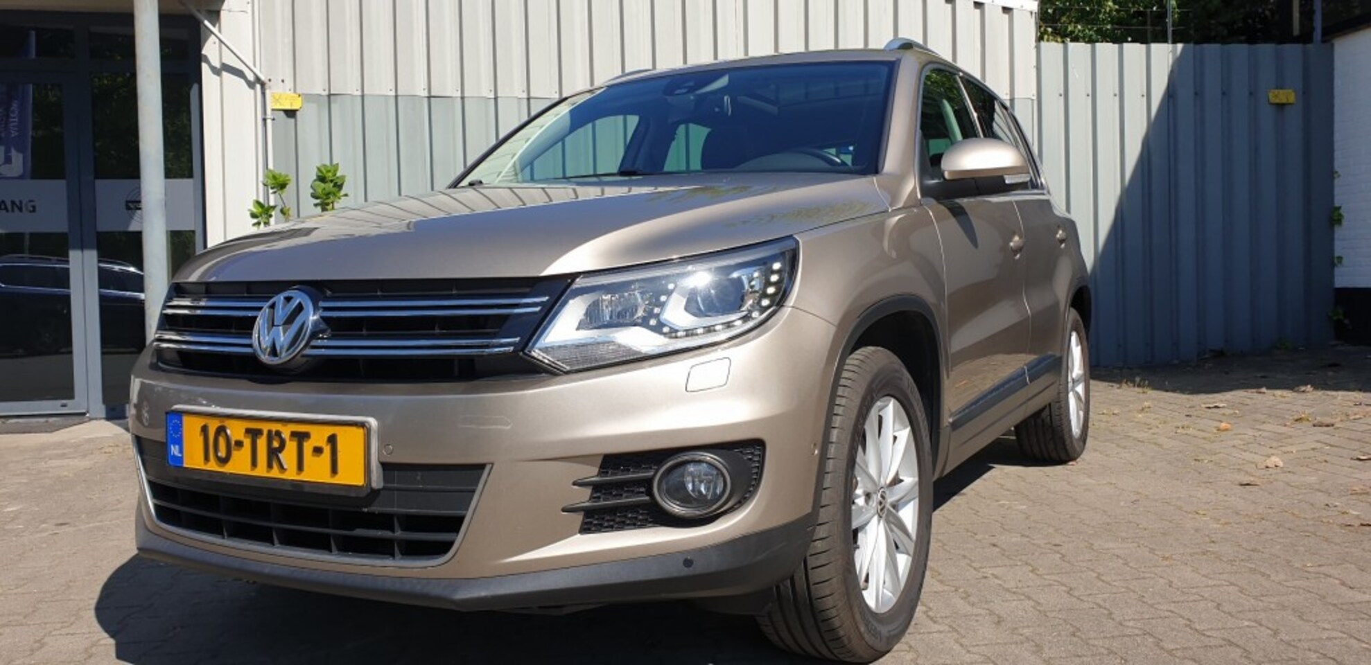 Volkswagen Tiguan - 1.4 TSI SPORTenSTYLE  Panoramadak - AutoWereld.nl