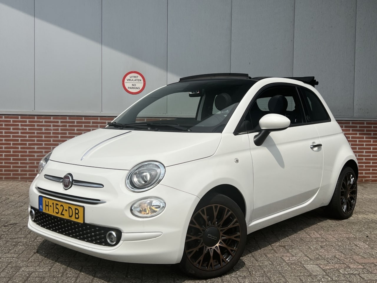 Fiat 500 C - TwinAir Turbo 85 PK 120TH | Leder | Navi | Carplay | Clima | 16" - AutoWereld.nl