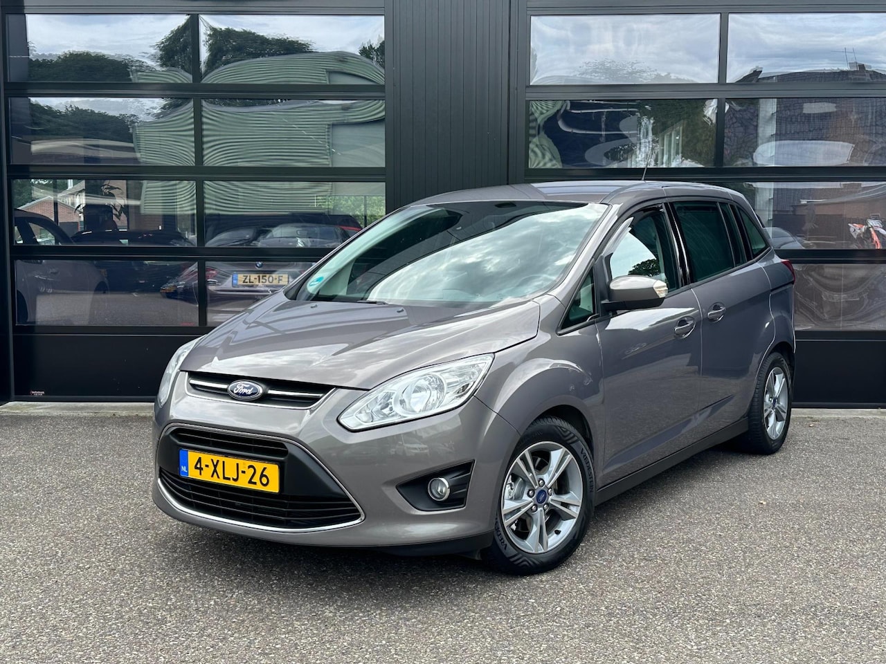 Ford Grand C-Max - 1.0 Edition Airco Navi Cruise Trekh. - AutoWereld.nl