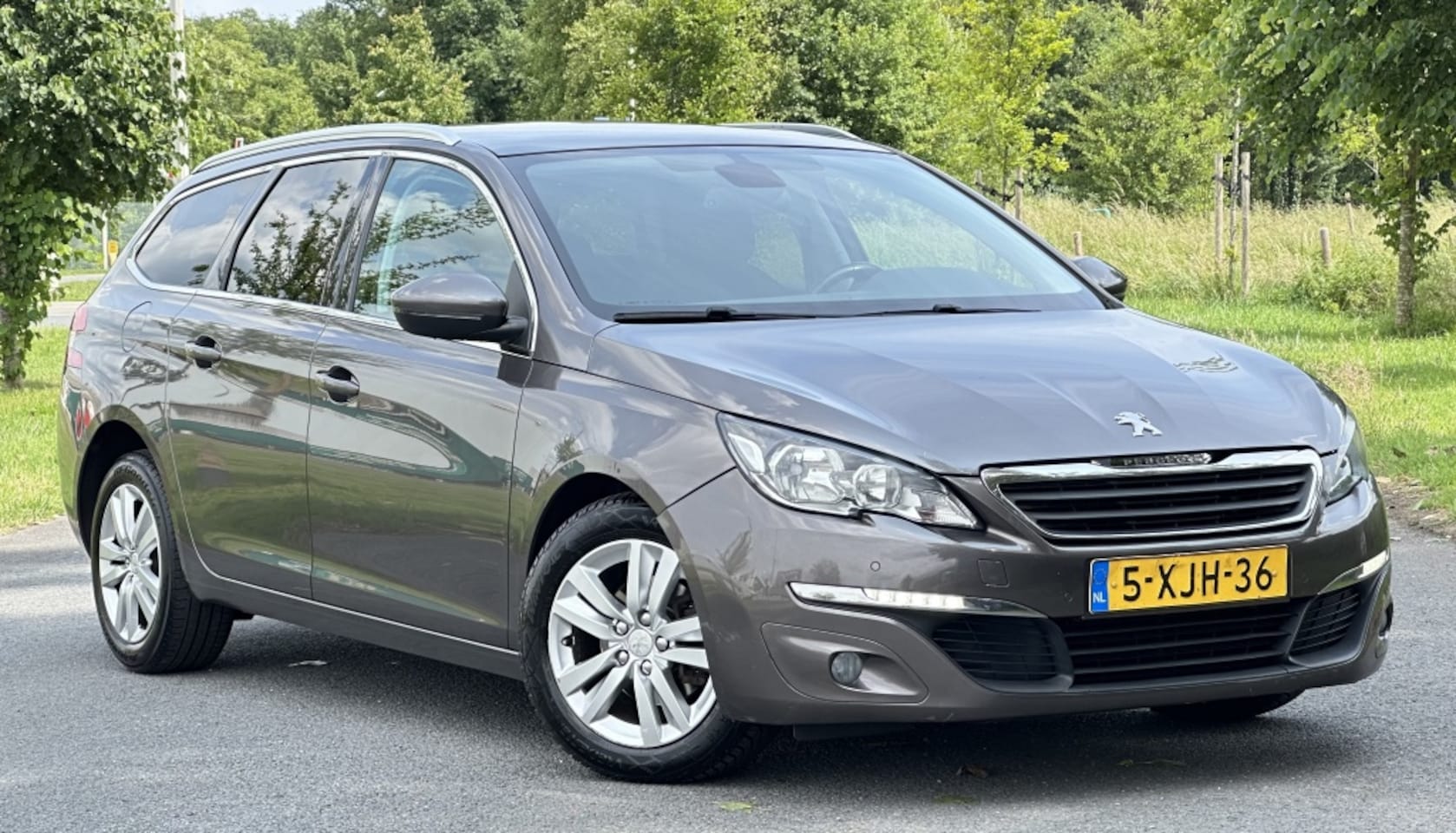 Peugeot 308 SW - 1.6 BlueHDI B. L. Ex - AutoWereld.nl