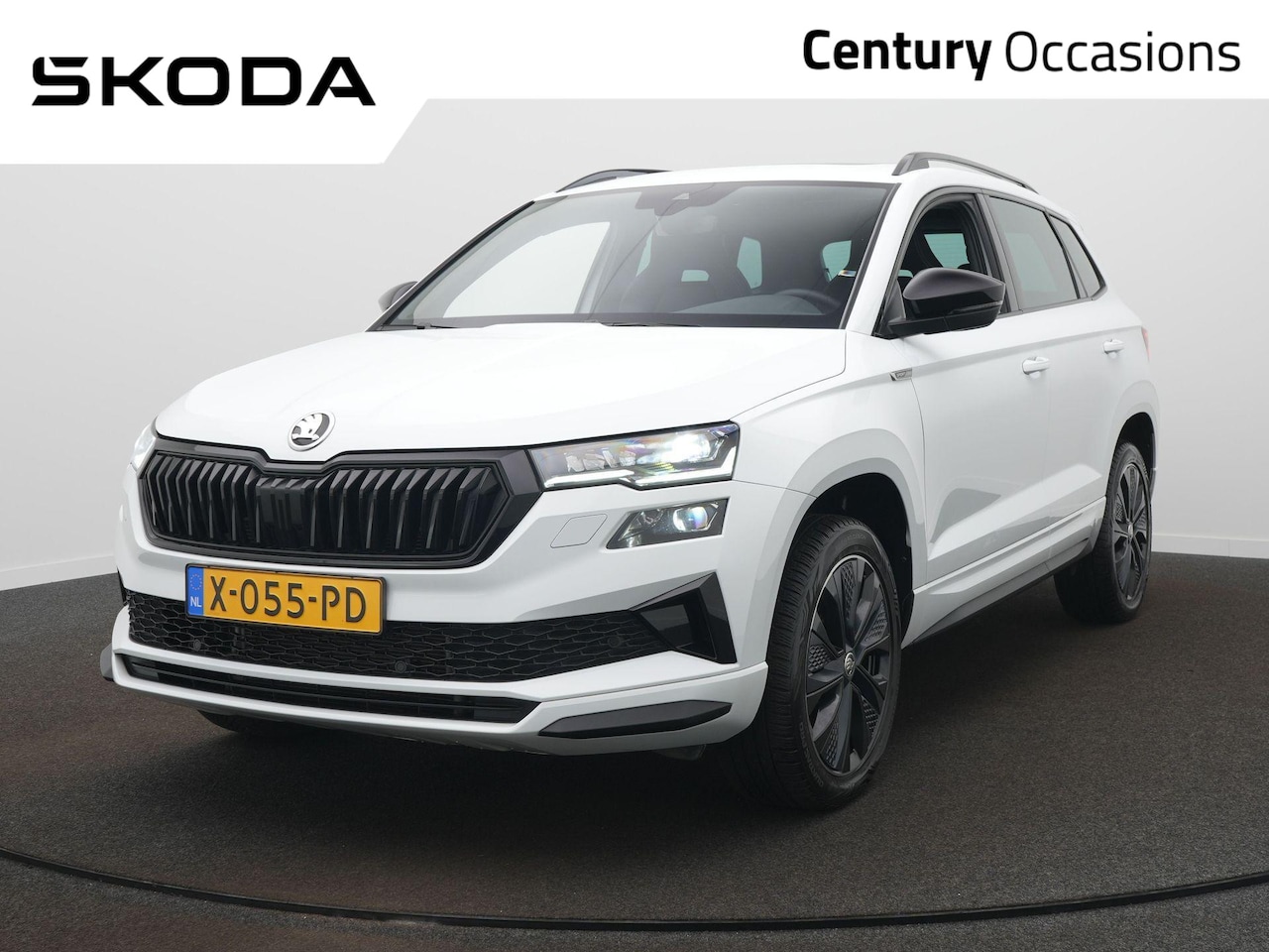Skoda Karoq - 1.5 TSI ACT Sportline Business Elektr. Haak / Camera / Adapt. Cruise / Clima - AutoWereld.nl