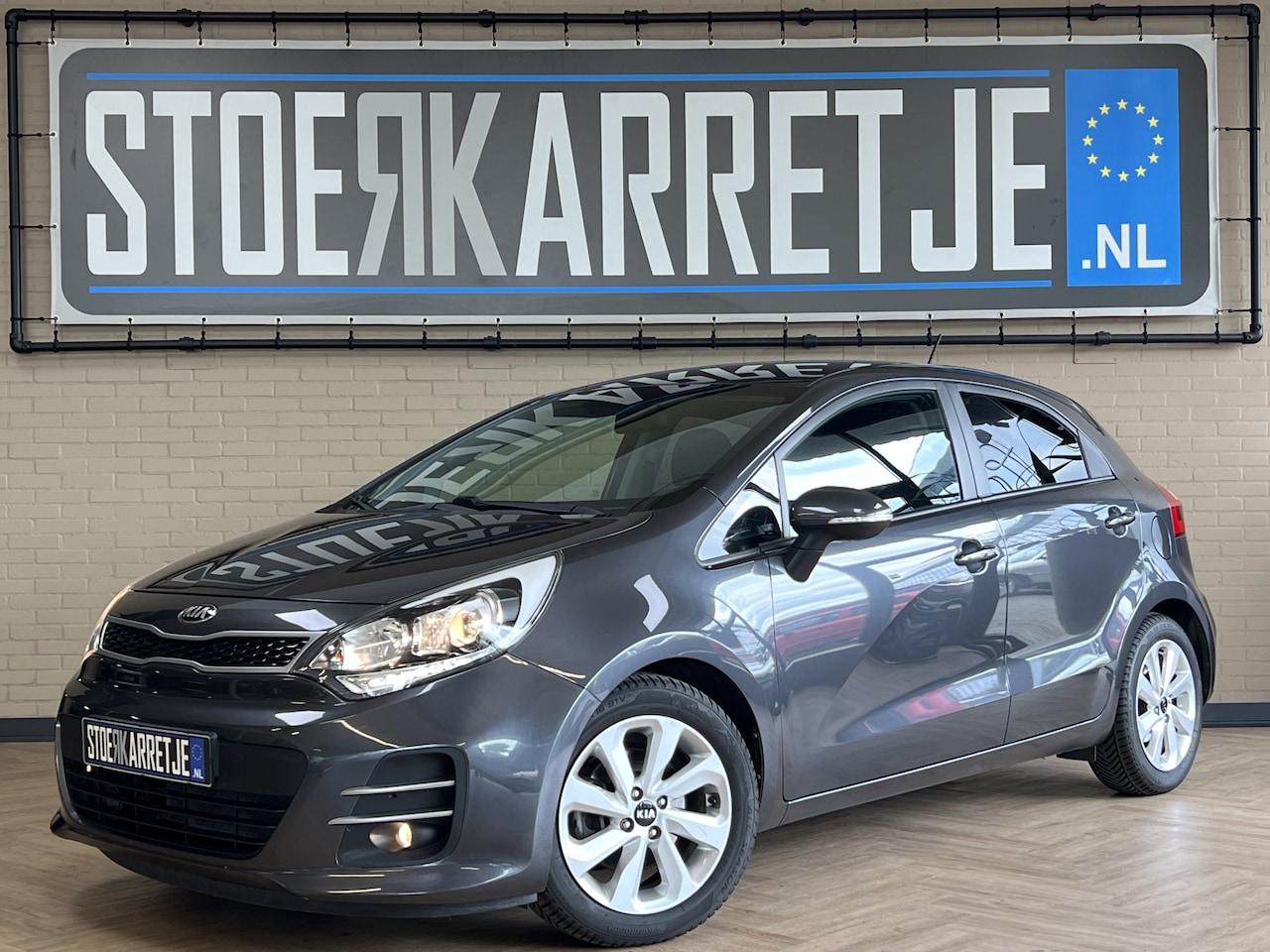 Kia Rio - 1.2 CVVT ExecutiveLine | Navi | Cruise | PDC | Camera | 16" | Stoel & stuur verwarming | K - AutoWereld.nl