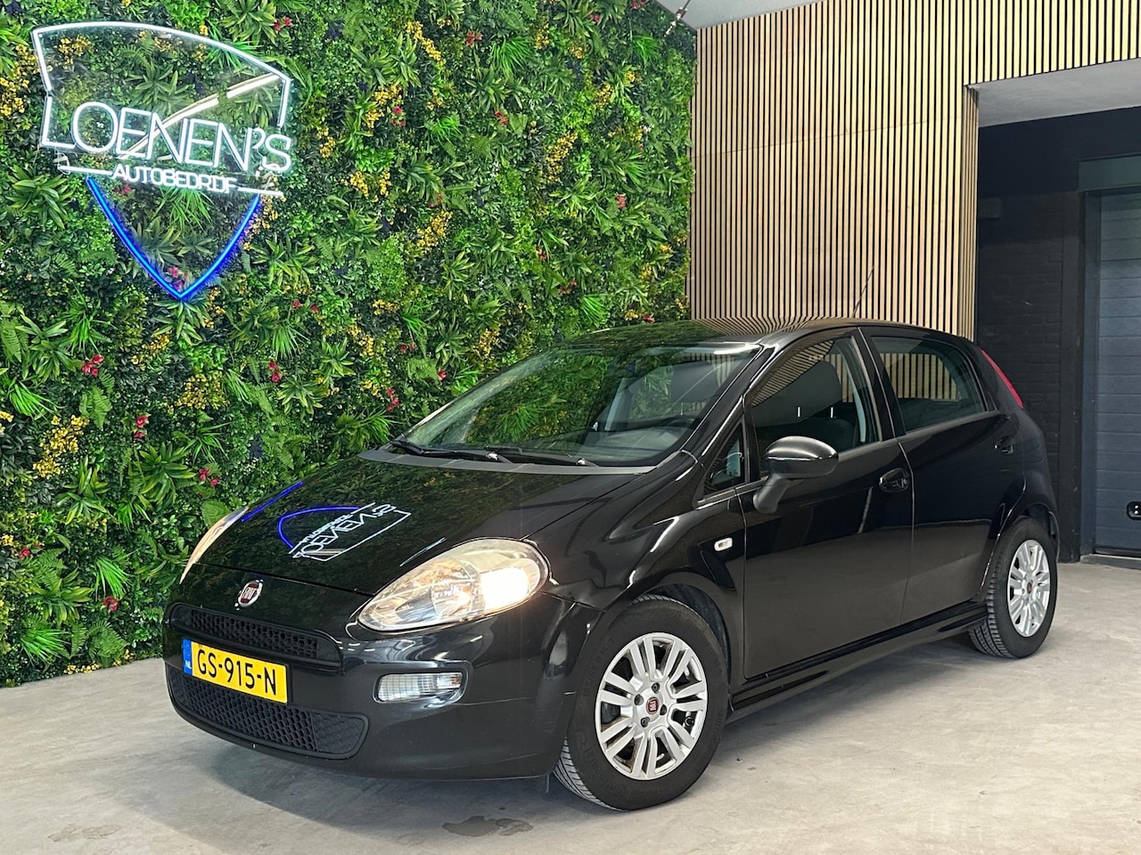 Fiat Punto Evo - 1.3 M-Jet Lounge / Cruise / Airco / Radio / Elektr ramen - AutoWereld.nl
