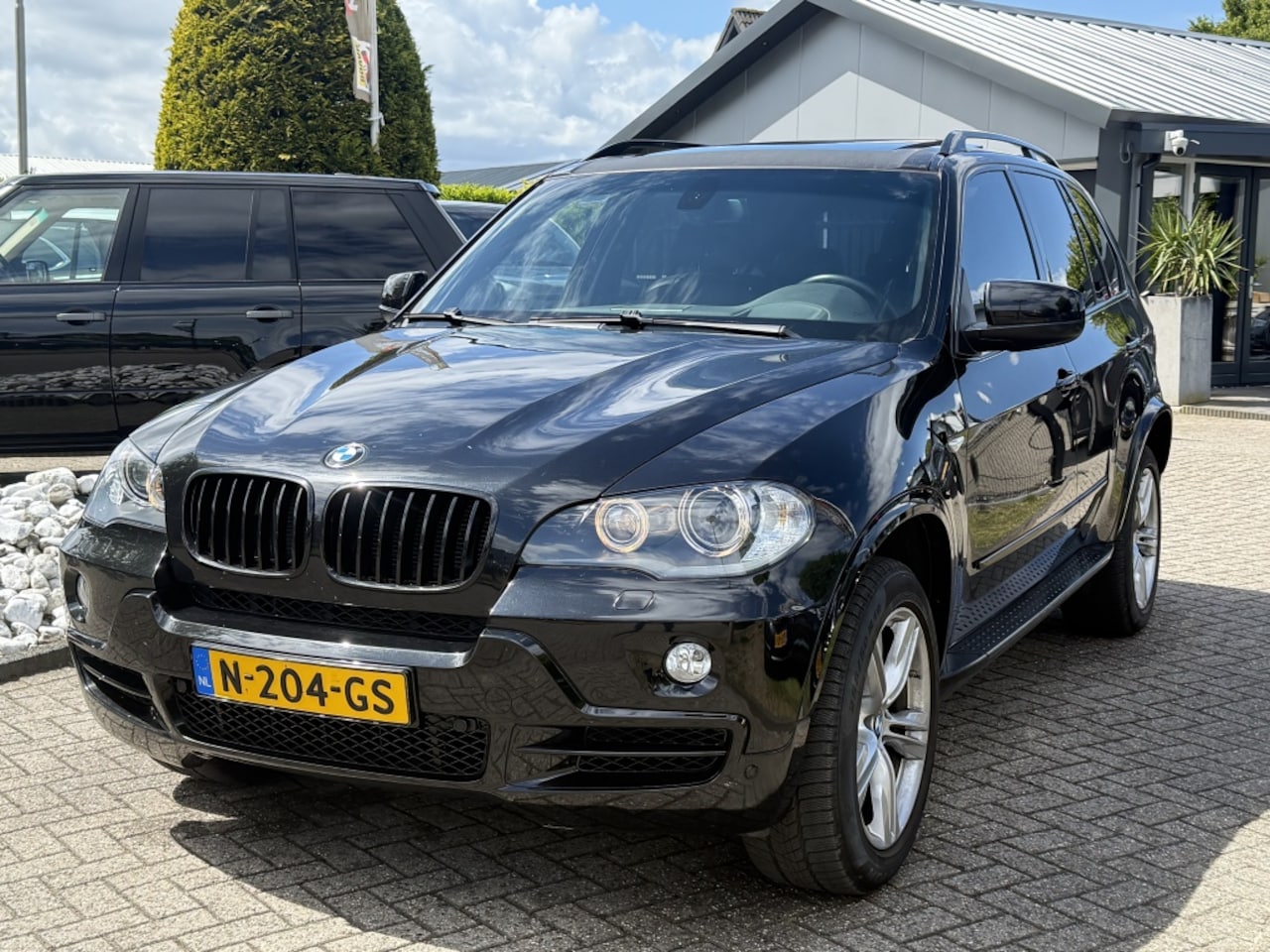 BMW X5 - 4.8i X-drive High Executive 2007 7-Persoons Youngtimer - AutoWereld.nl