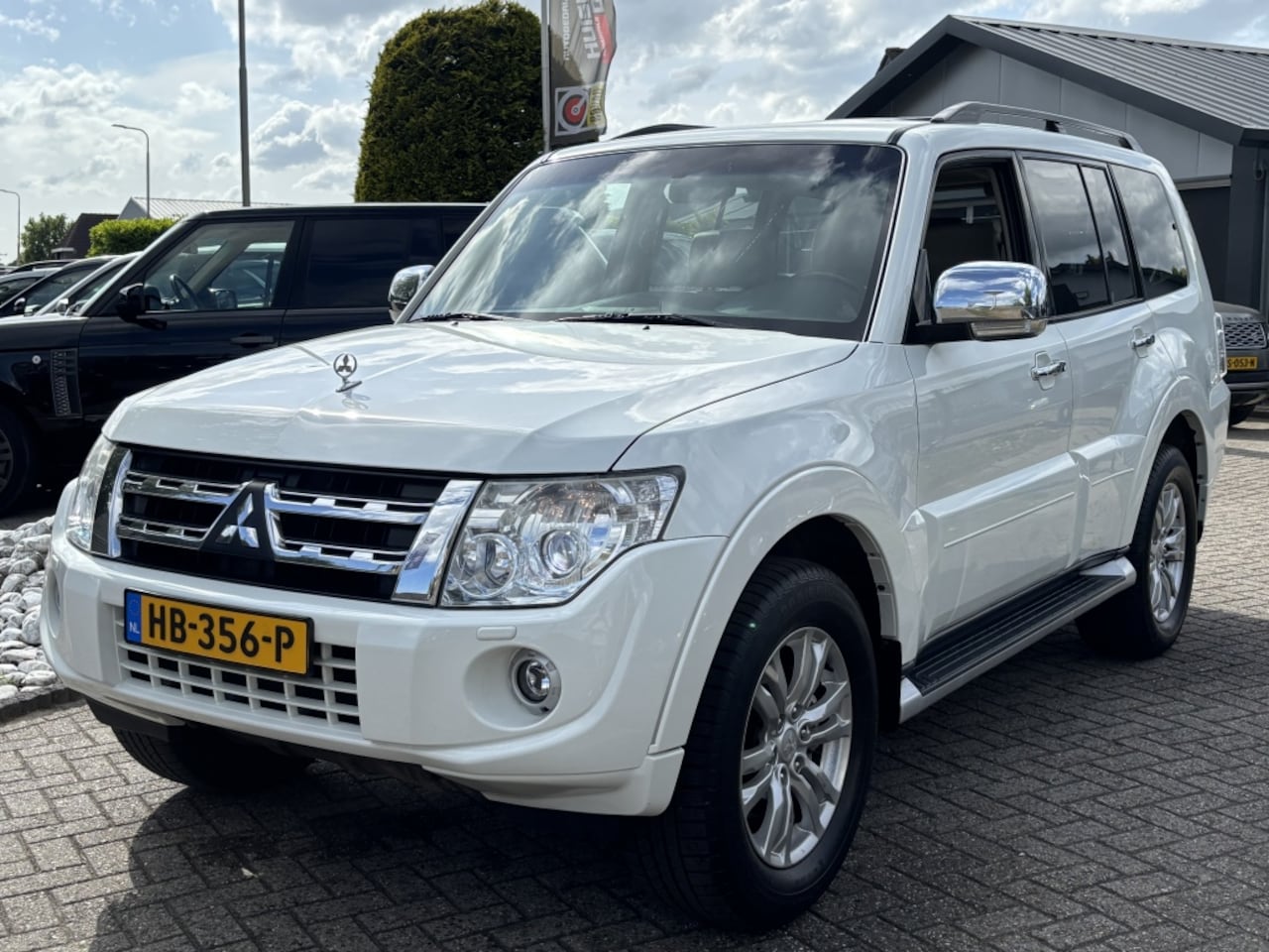 Mitsubishi Pajero - 3.8 V6 Instyle 7-Persoons 2014 Wit Schuifdak - AutoWereld.nl
