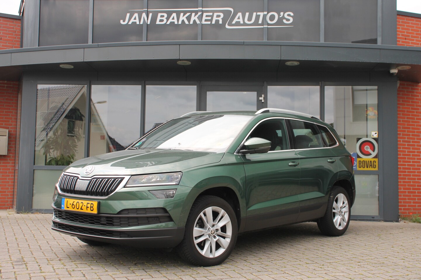 Skoda Karoq - 1.0 TSI Business Edition Plus ✅ Virt. Cockpit ✅ CarPlay ✅ Camera - AutoWereld.nl