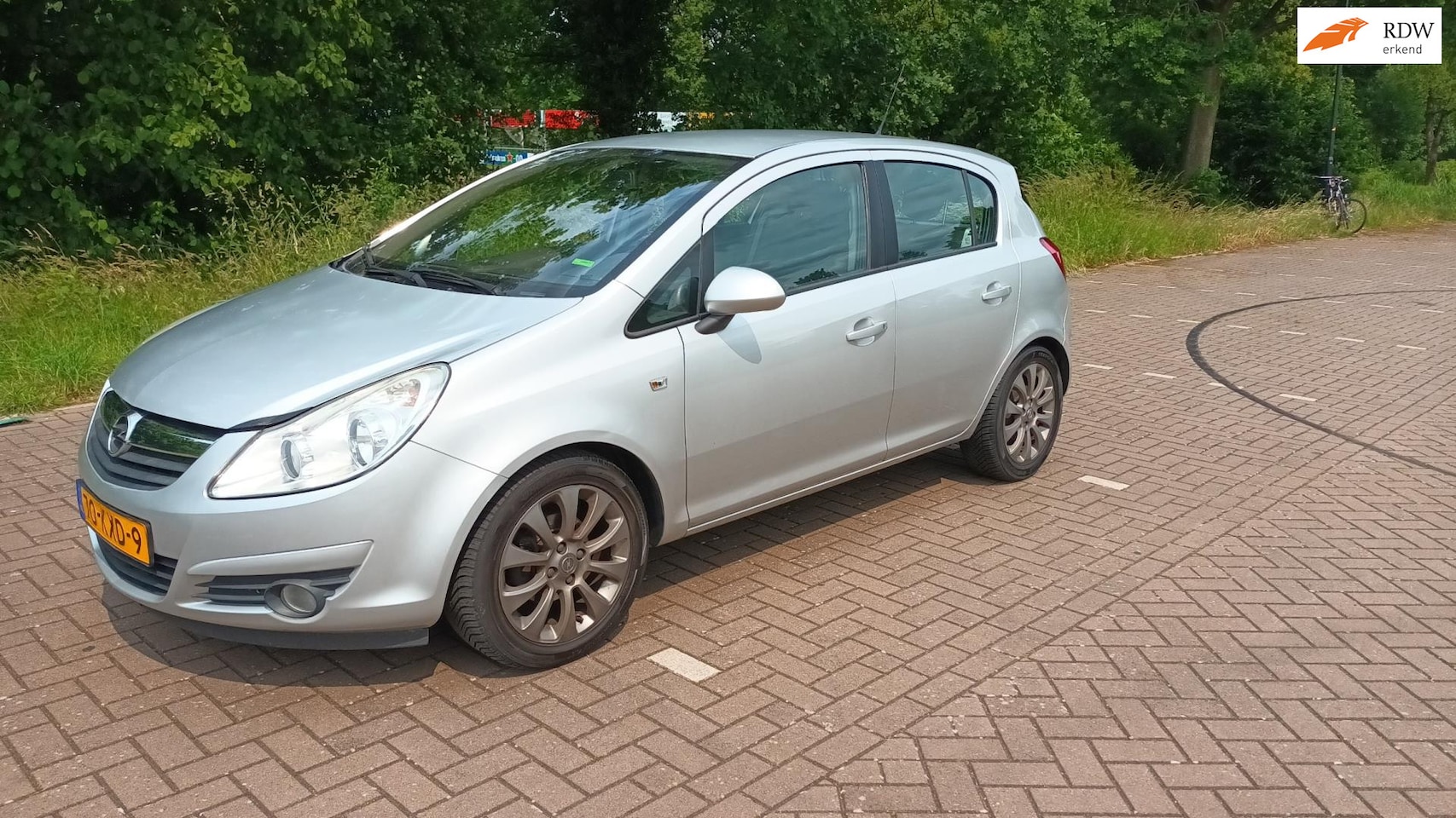 Opel Corsa - 1.4-16V Cosmo Clima / Pdc - AutoWereld.nl