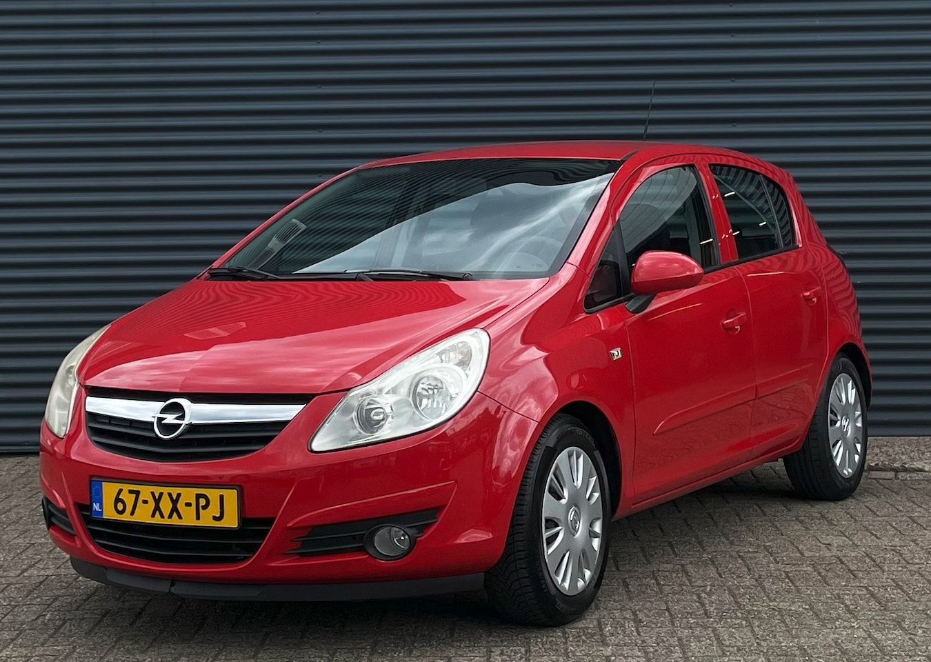 Opel Corsa - 1.4 5 Deurs Enjoy - AutoWereld.nl
