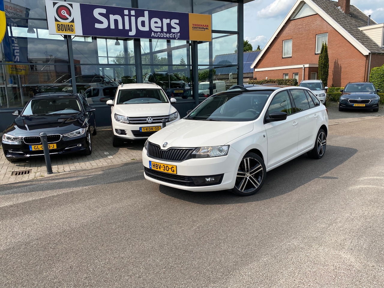 Skoda Rapid Spaceback - 1.4 TSI Greentech Elegance Businessline PANO/NAVI - AutoWereld.nl