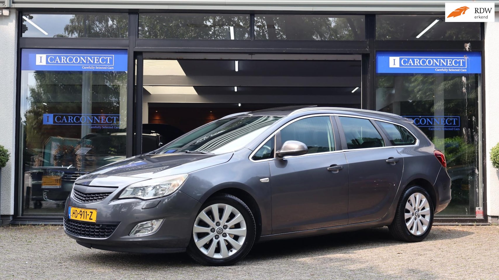 Opel Astra Sports Tourer - 1.7 CDTi Cosmo|Dakje|Trekhaak|PDC|Cruise|Clima - AutoWereld.nl