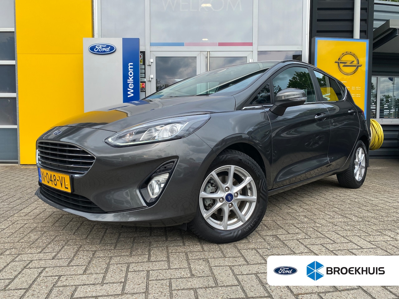 Ford Fiesta - 1.0 100PK ECOBOOST TITANIUM | STOEL, STUUR EN VOORRUITVERWARMING| PARKEERSENSOREN| CRUISE - AutoWereld.nl