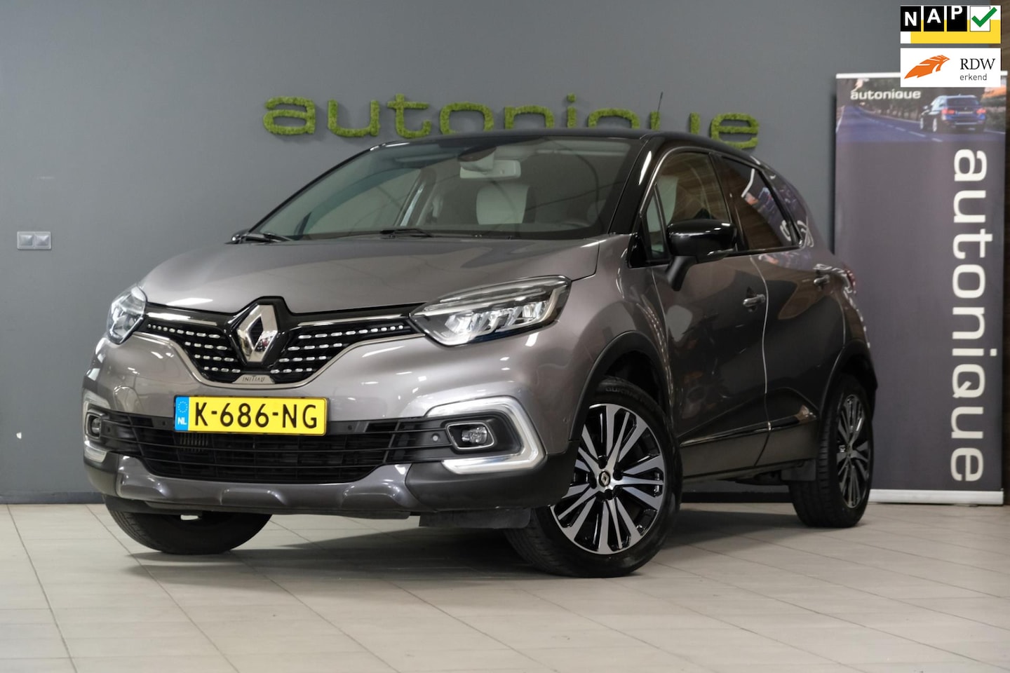 Renault Captur - 1.2 TCe Initiale Paris 71dkm! Leder/Navi/Camera/Trekhaak ALL-Season - AutoWereld.nl