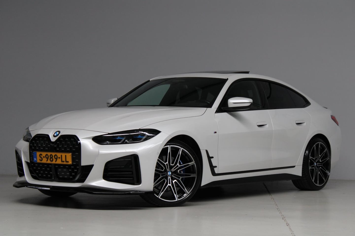 BMW 4-serie Gran Coupé - 430i High Executive M-sport [ schuifkanteldak adap. cruise harmankardon laser led elek. tr - AutoWereld.nl
