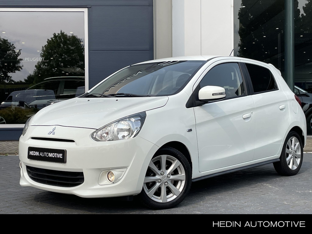 Mitsubishi Space Star - 1.2 80PK Intense+ | Climate Control | Cruise Control | Lichtmetalen Velgen - AutoWereld.nl