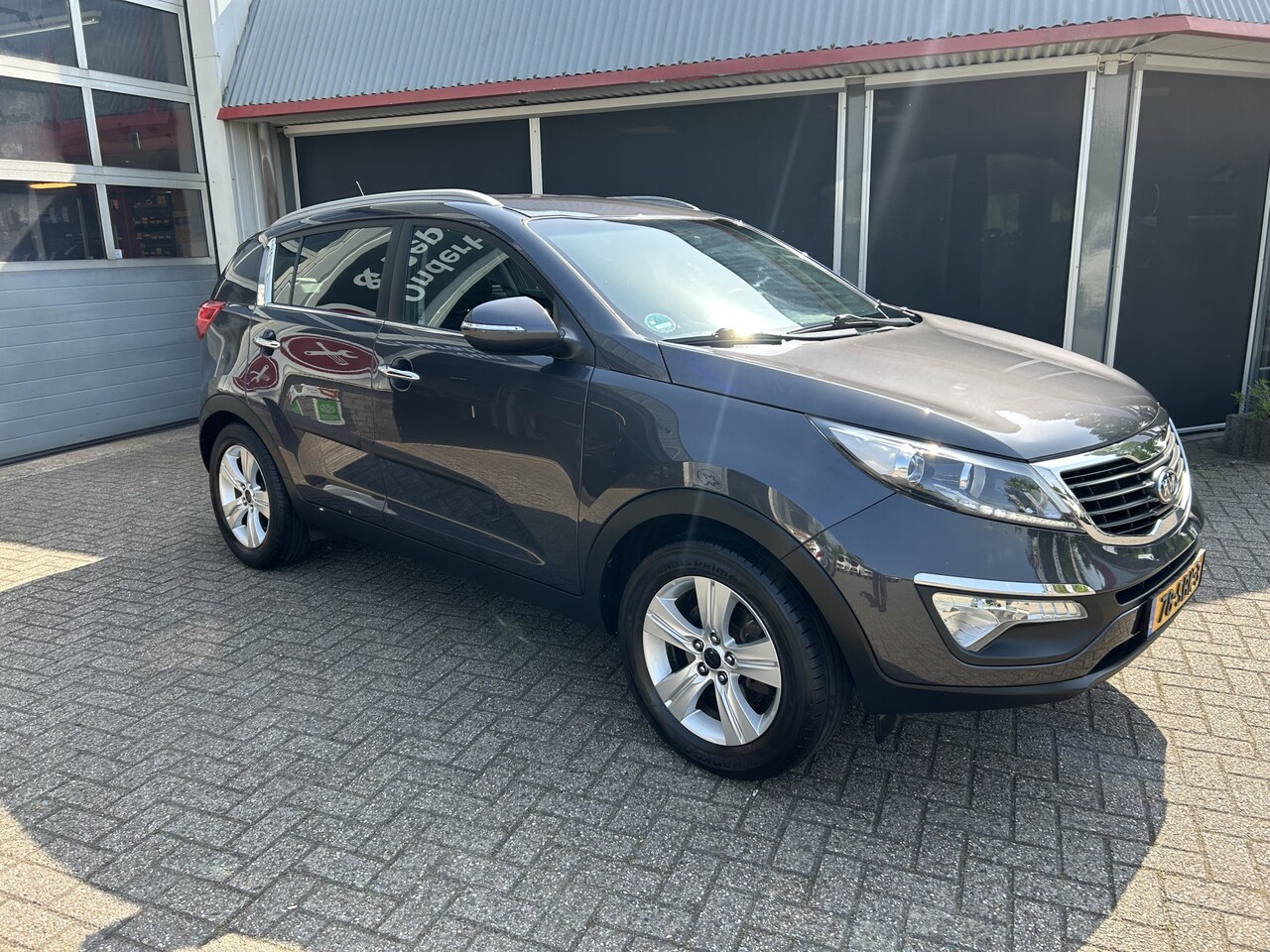Kia Sportage - 1.6 GDI X-ecutive Plus Pack 1.6 GDI X-ecutive Plus Pack - AutoWereld.nl