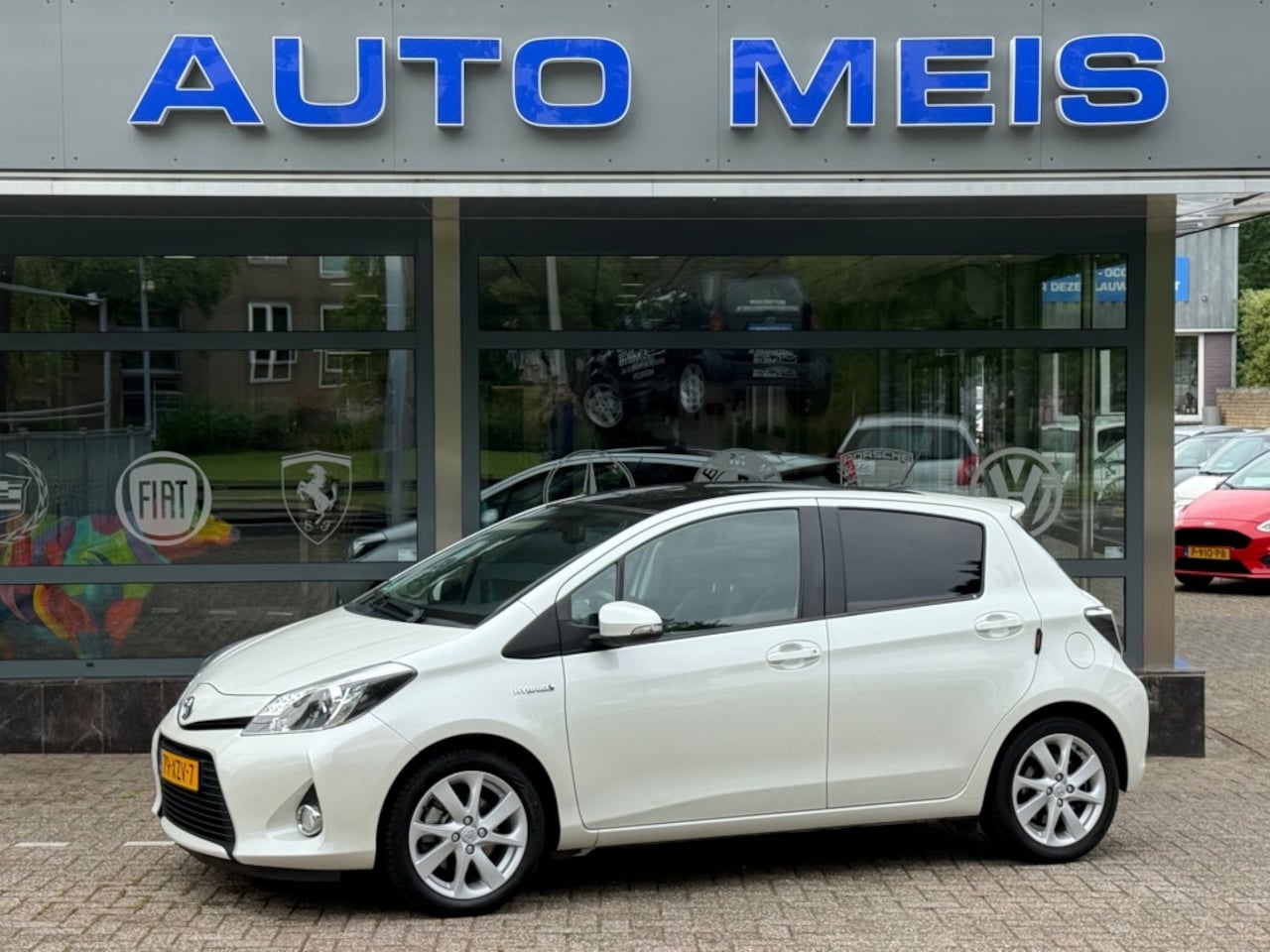 Toyota Yaris - 1.5 Full Hybrid Dynamic Panoramadak Navi Clima Camera Cruise - AutoWereld.nl