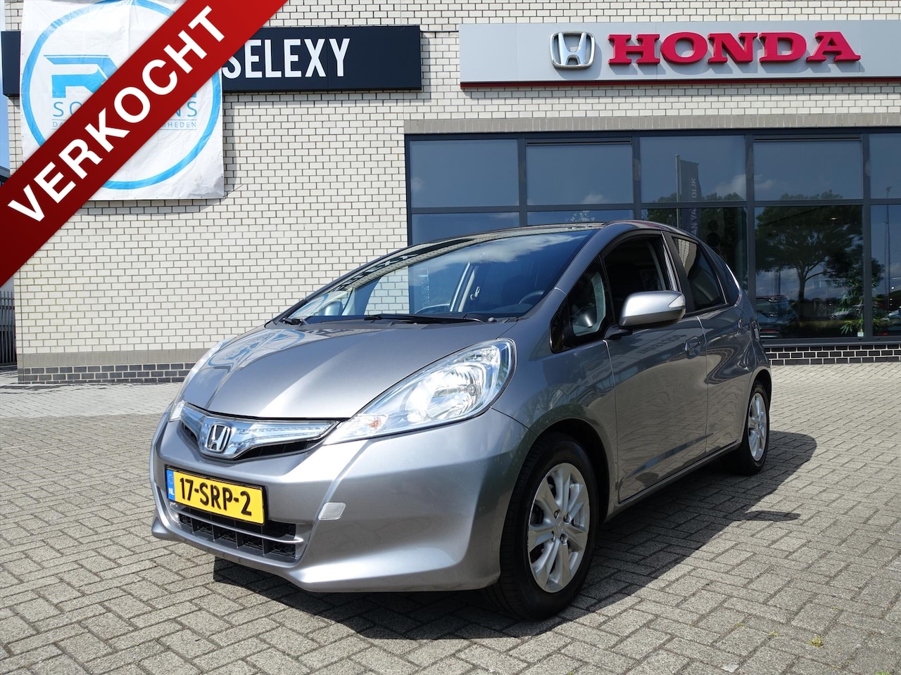 Honda Jazz - Hybrid 1.4 i-VTEC 102pk CVT Elegance 101583 km - AutoWereld.nl