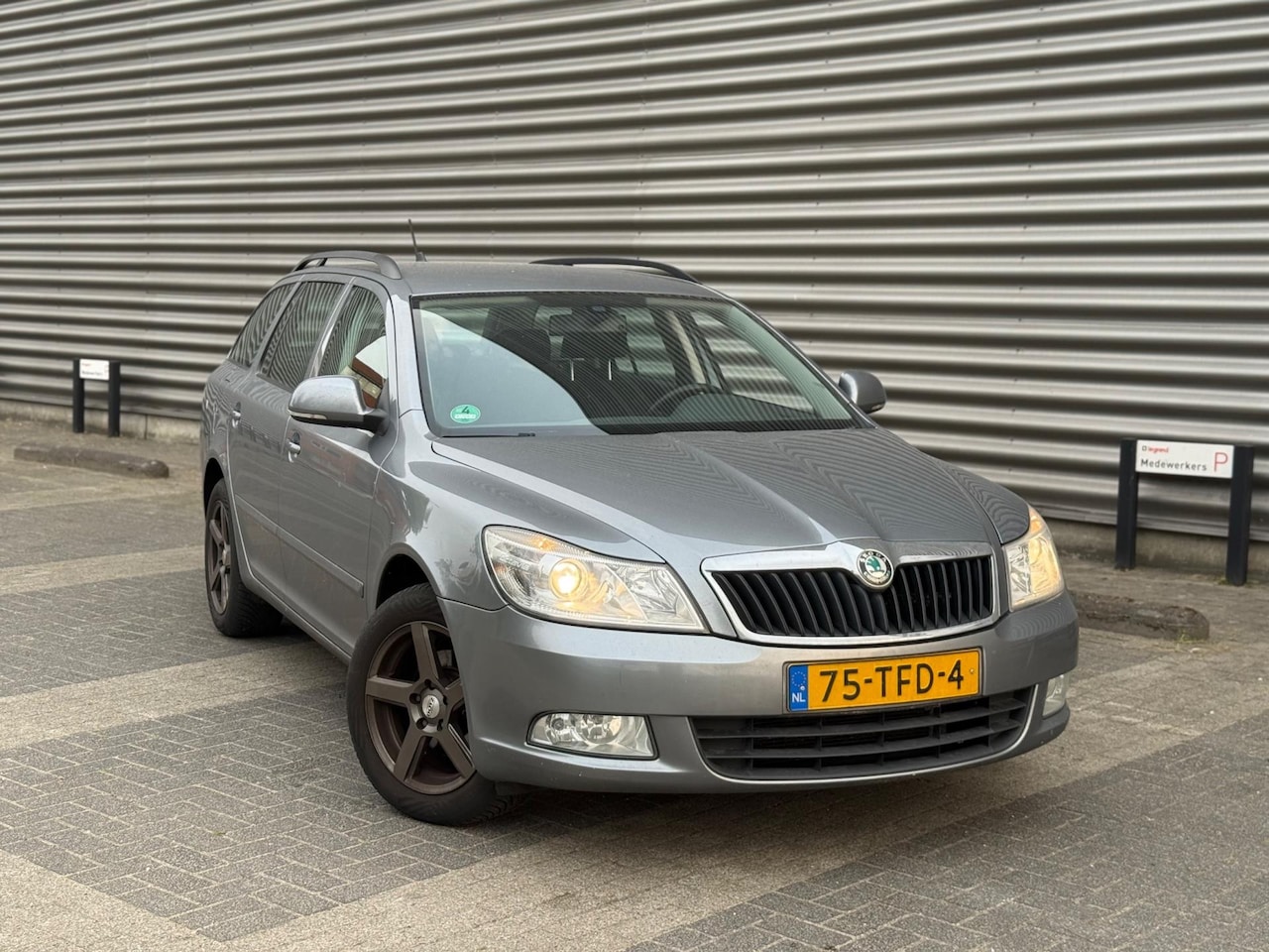 Skoda Octavia Combi - 1.2 TSI Business (bj 2012) NAVI|CLIMA||NW APK! - AutoWereld.nl