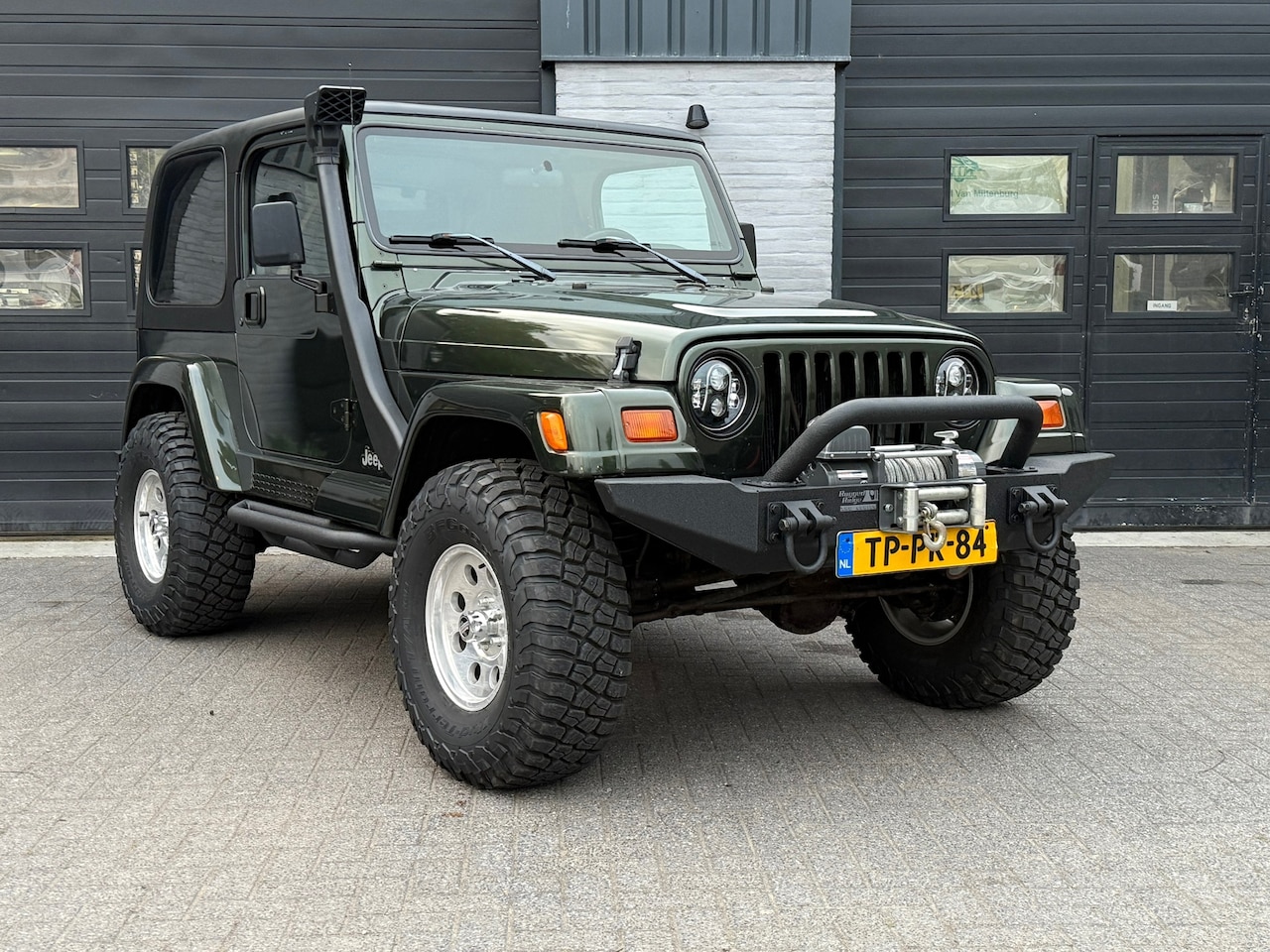 Jeep Wrangler - 4.0i Hardtop Sahara 4.0i Hardtop Sahara, Lier, Verhoogd 33inch Banden Nl Auto - AutoWereld.nl