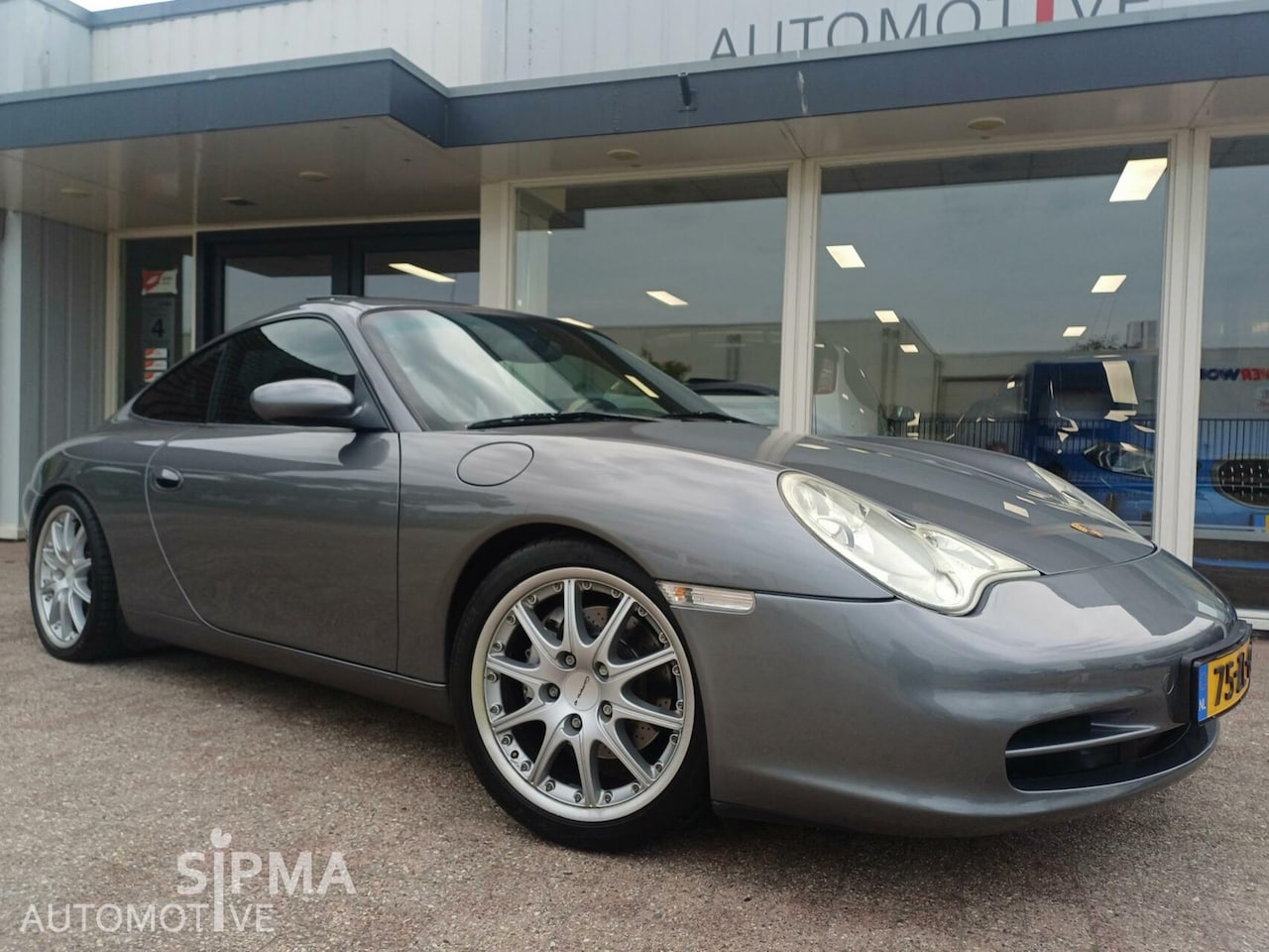 Porsche 911 - 3.6 Coupé Carrera 4 3.6 Coupé Carrera 4 - AutoWereld.nl