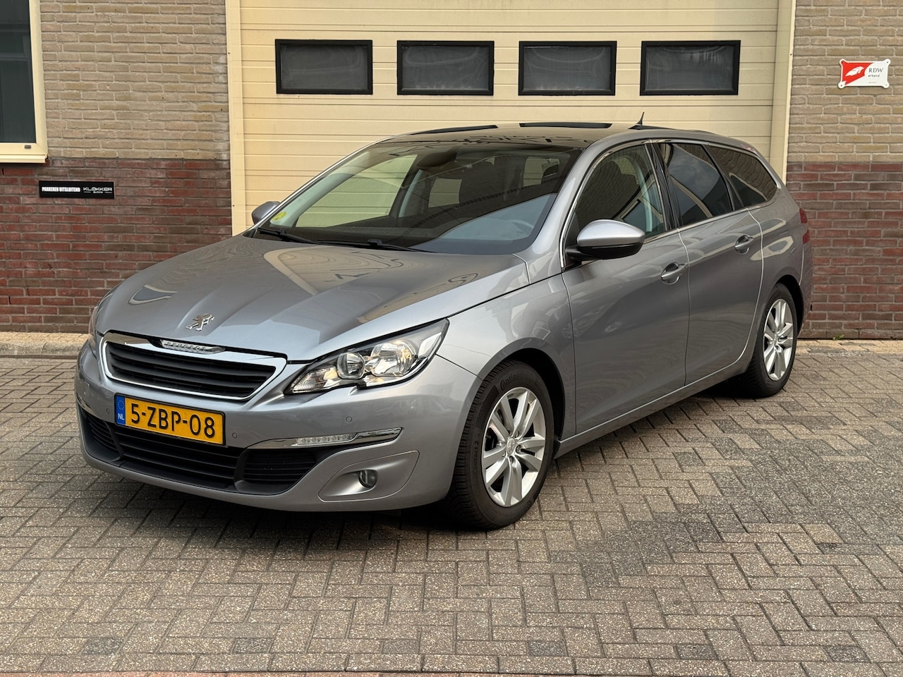 Peugeot 308 SW - 1.6 BlueHDI Blue Lease Limited Navi | Panoramadak | Climate | - AutoWereld.nl