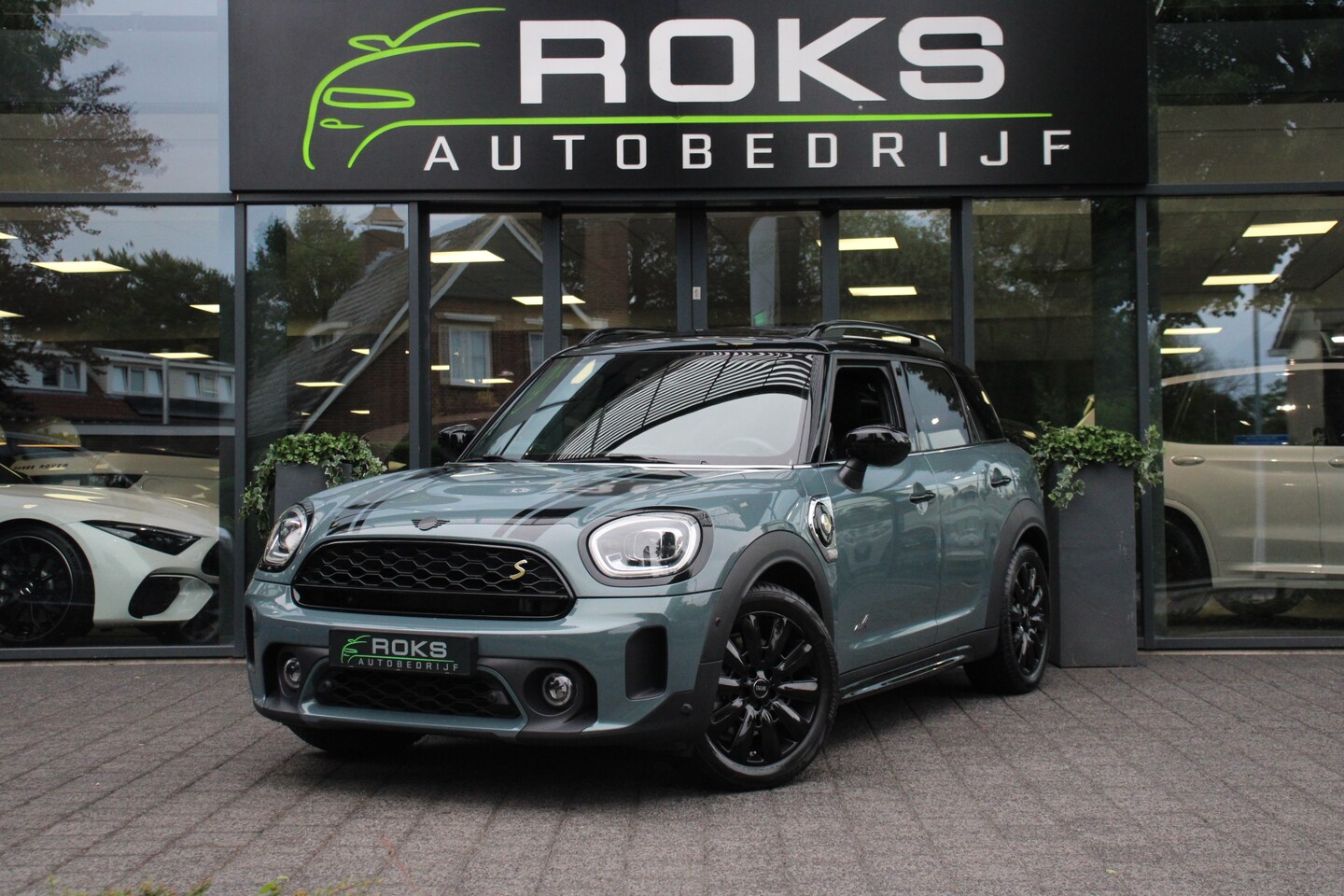 MINI Countryman - Mini 2.0 Cooper S E ALL4 Black-Optic Camera/Headup/Keyless/Leder/Panoramadak - AutoWereld.nl